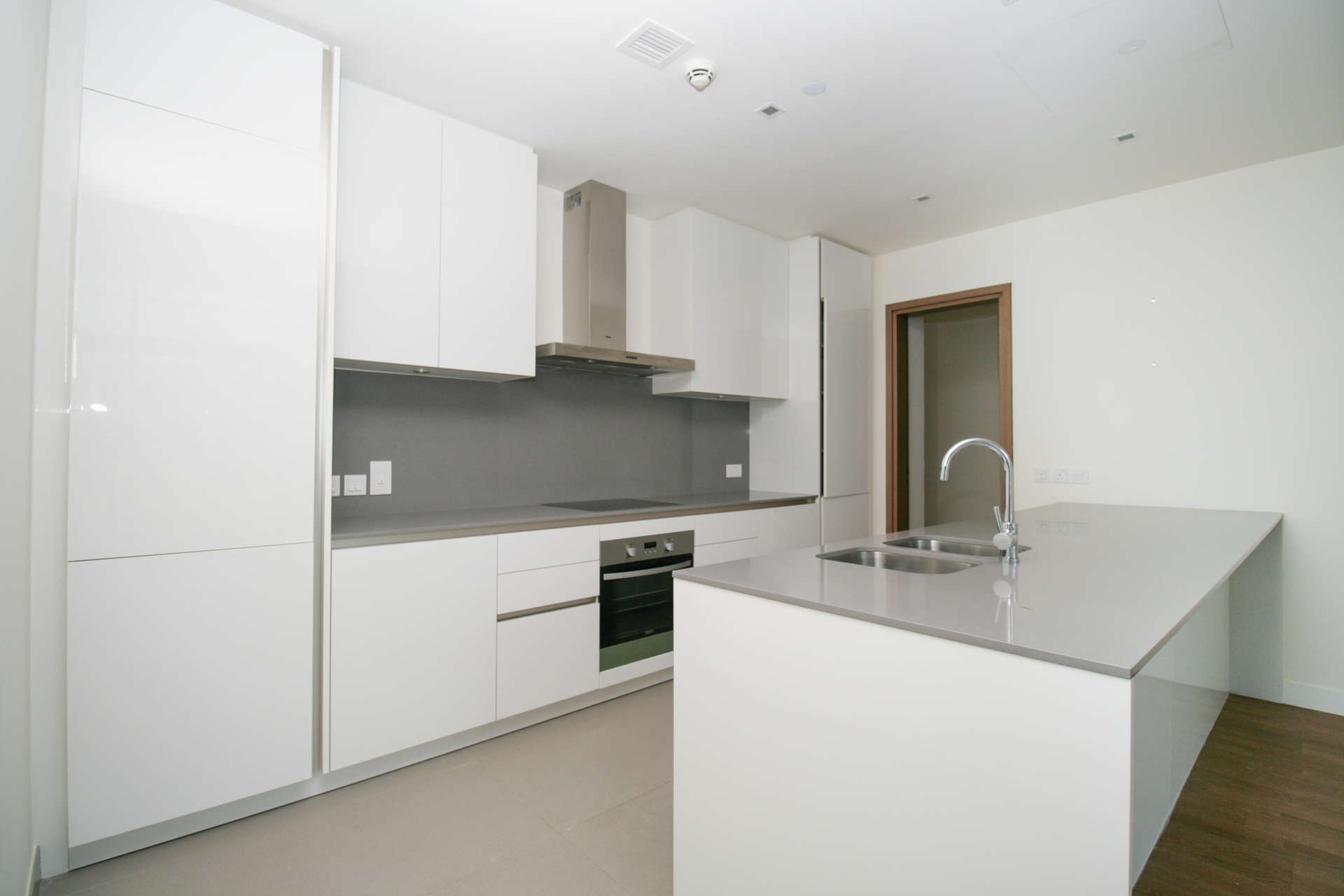 Spacious living area with modern kitchen in City Walk, Dubai apartment for rent