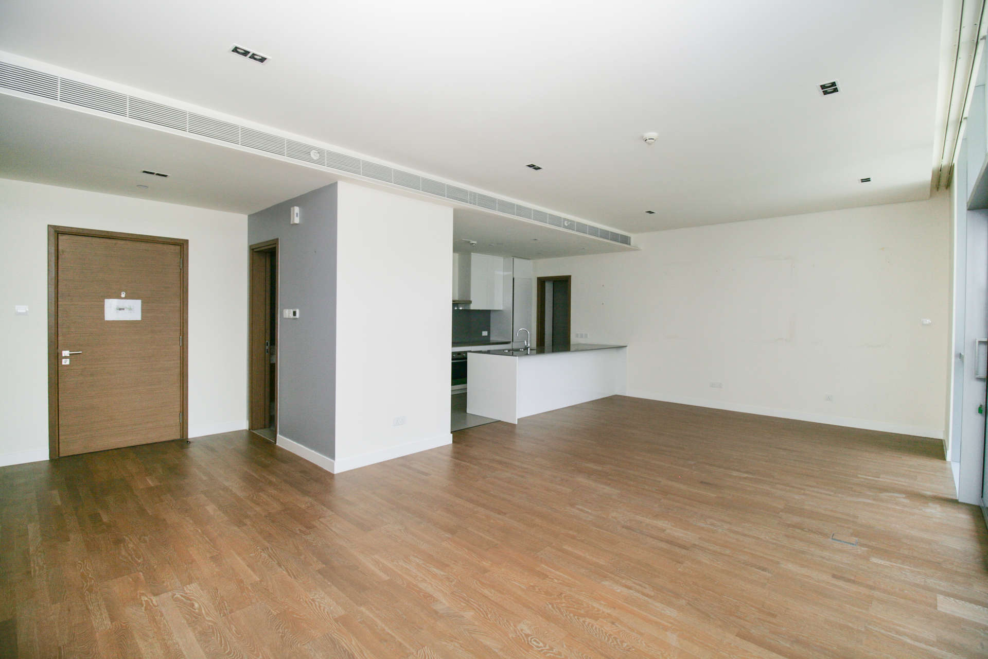 Modern living room with large windows in City Walk, Dubai apartment for rent