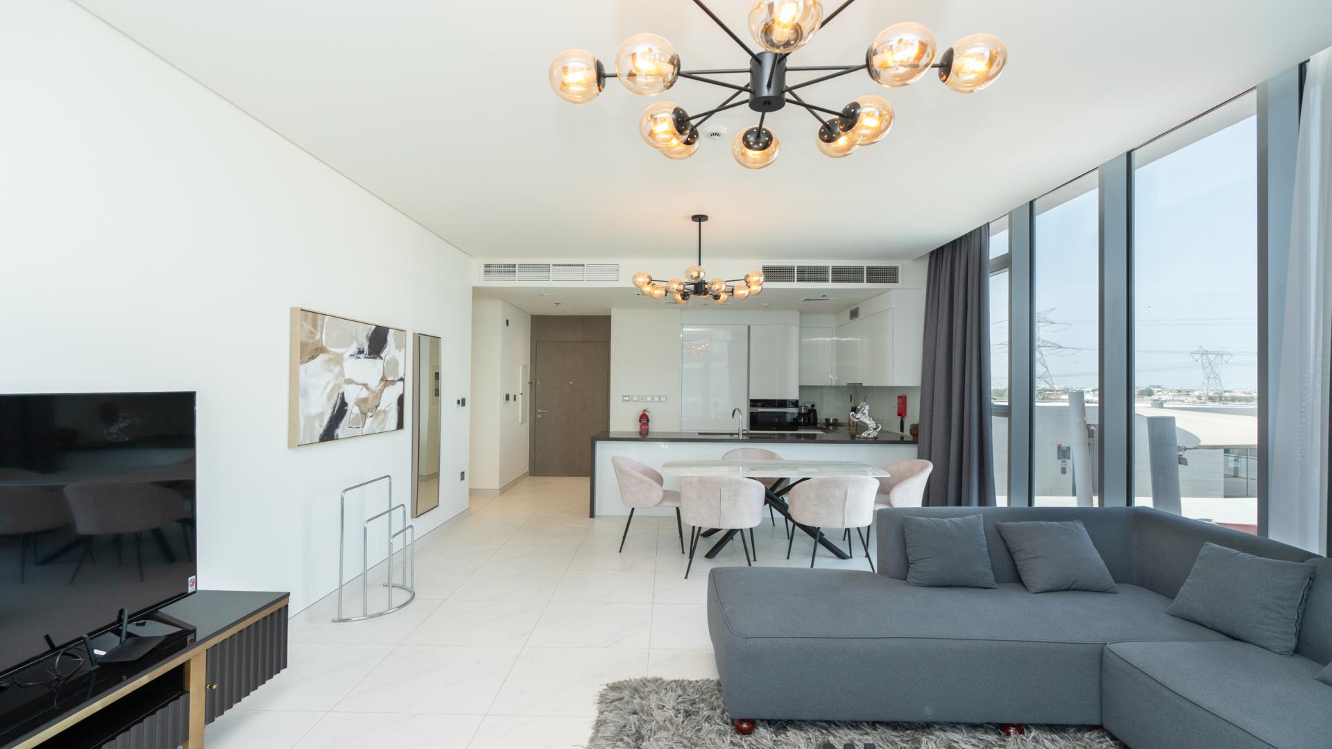 Modern kitchen and dining area in fully furnished 2-bedroom apartment, District One, Dubai