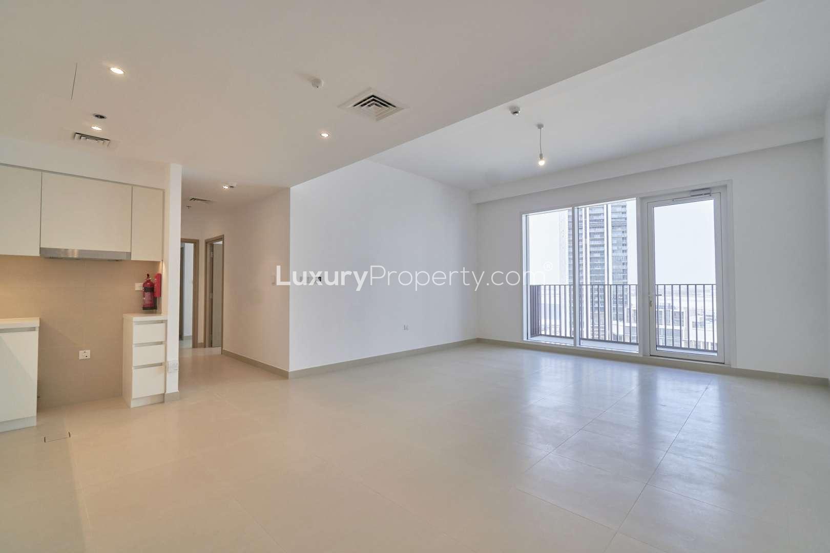 Open-plan living area in Creek Horizon two-bedroom apartment, Dubai Creek Harbour