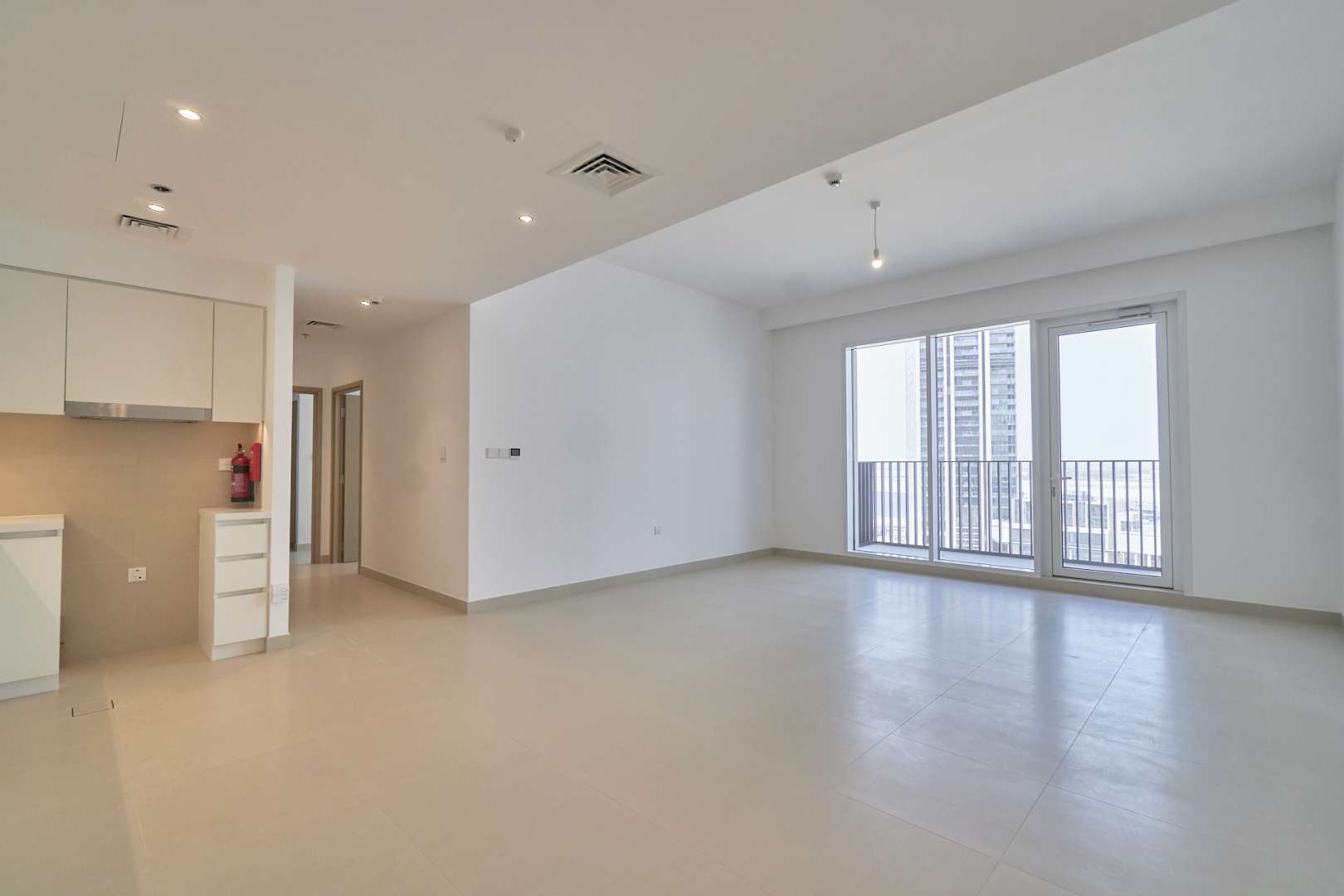 Open-plan living area in Creek Horizon two-bedroom apartment, Dubai Creek Harbour