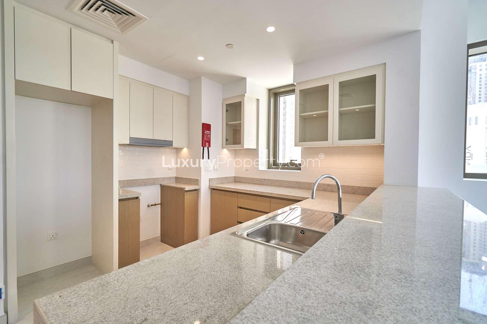 Spacious open-plan kitchen and living area in Dubai Creek Harbour apartment for rent