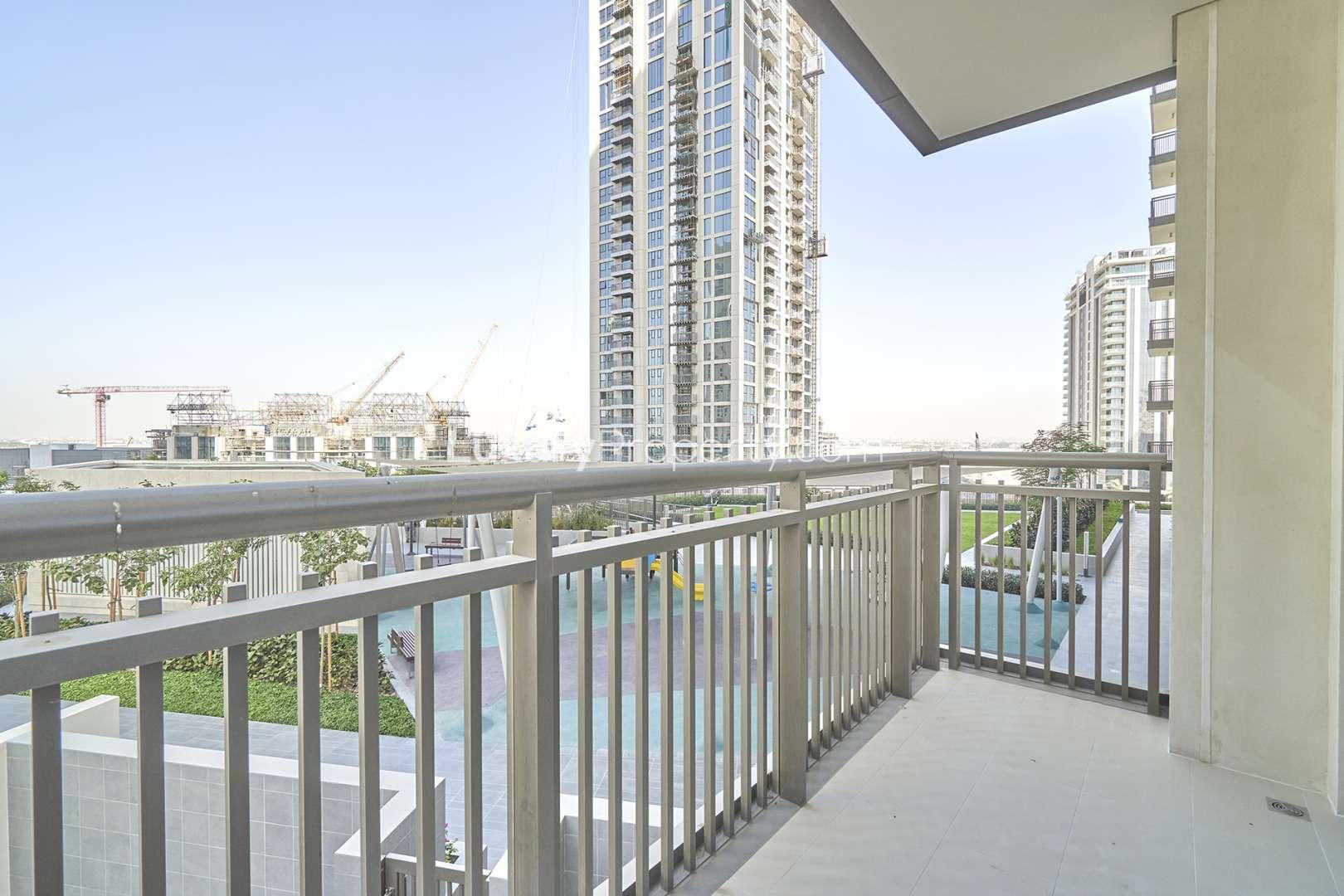 Bright living room with large windows in Dubai Creek Harbour apartment for rent