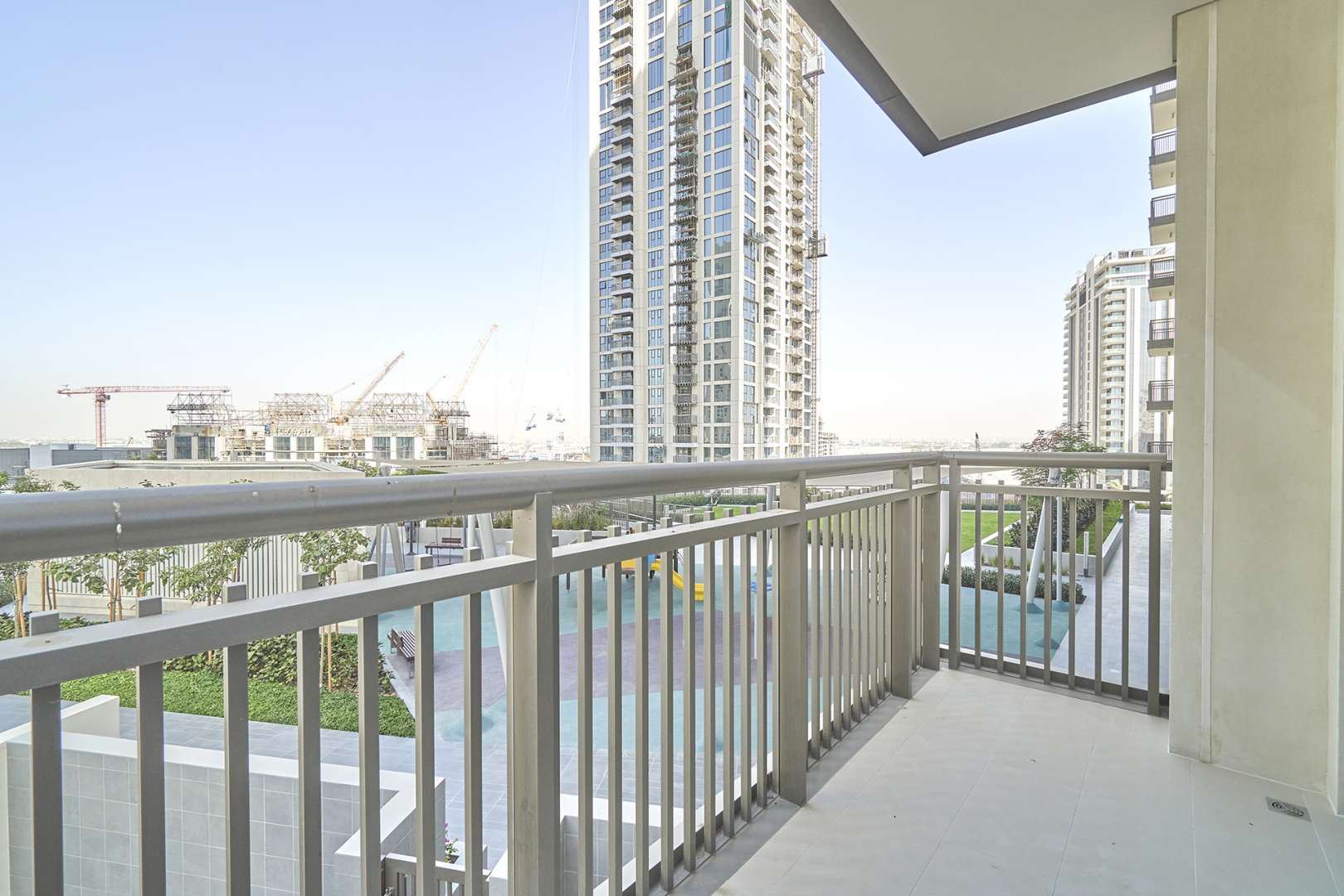 Bright living room with large windows in Dubai Creek Harbour apartment for rent