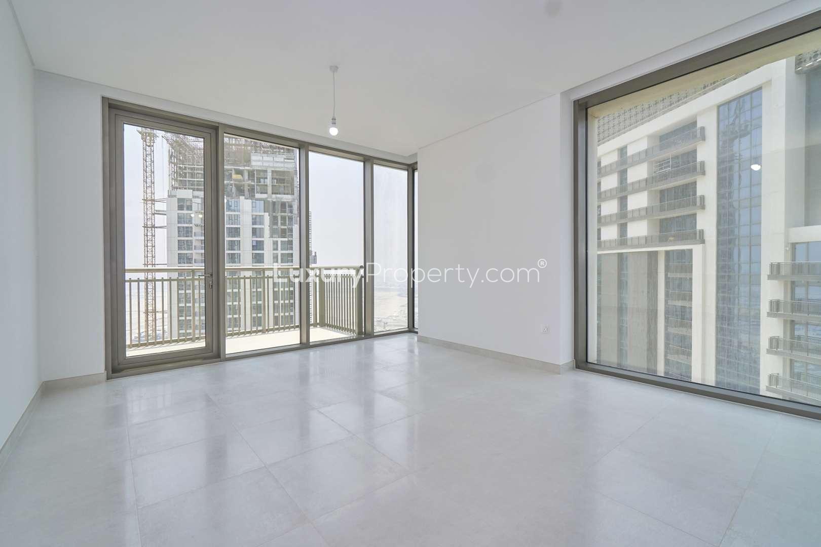 Bright open-plan living area in Creekside 18 apartment, Dubai Creek Harbour