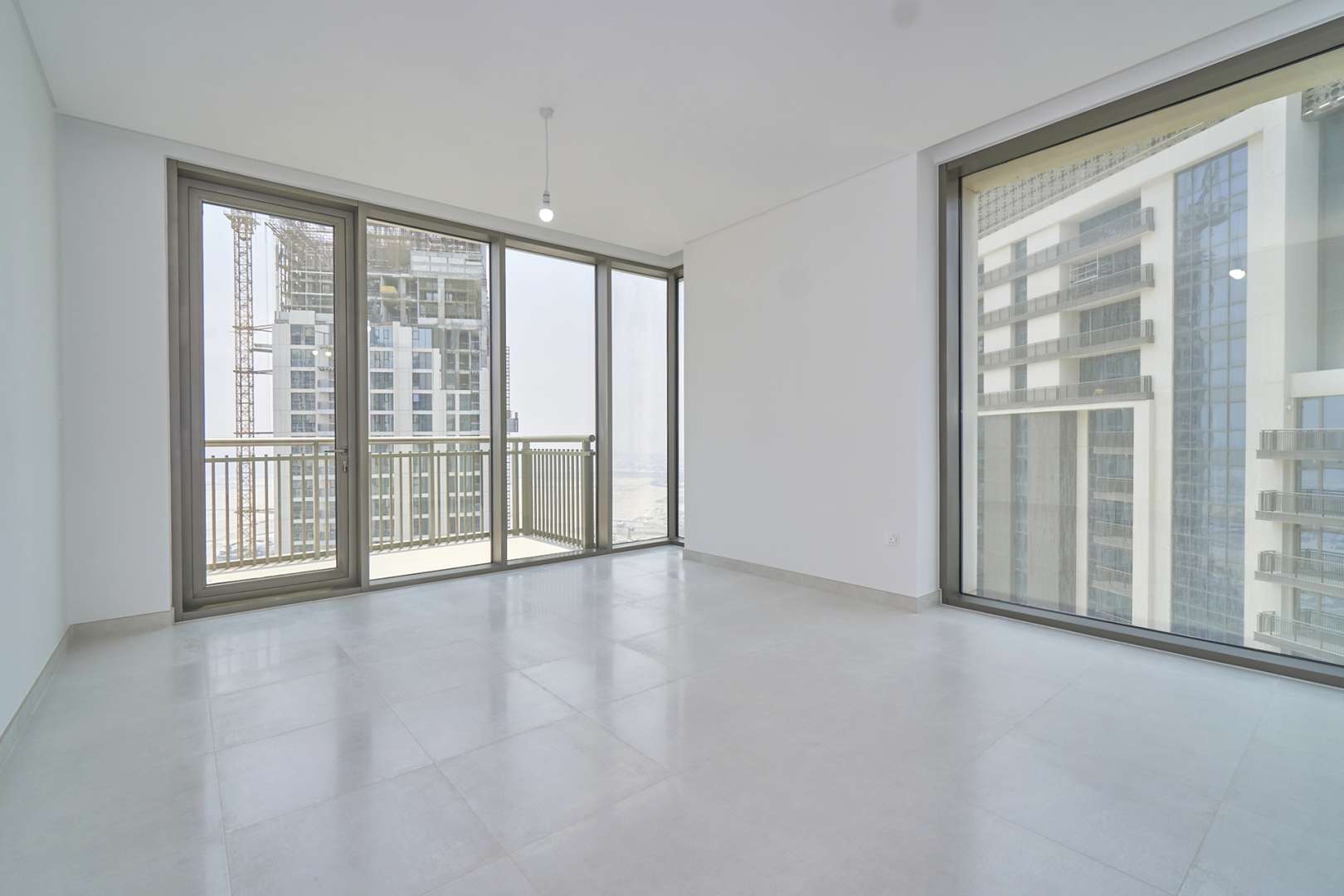 Bright open-plan living area in Creekside 18 apartment, Dubai Creek Harbour