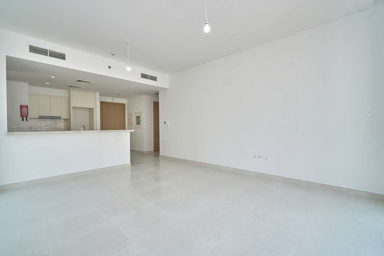 High-floor apartment interior with modern kitchen, large window, in Creekside 18, Dubai Creek Harbour