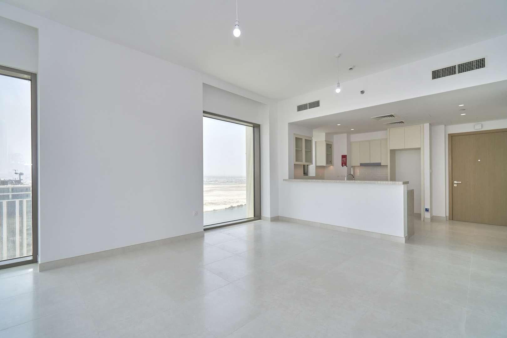 High-floor apartment interior with open kitchen in Creekside 18, Dubai Creek Harbour