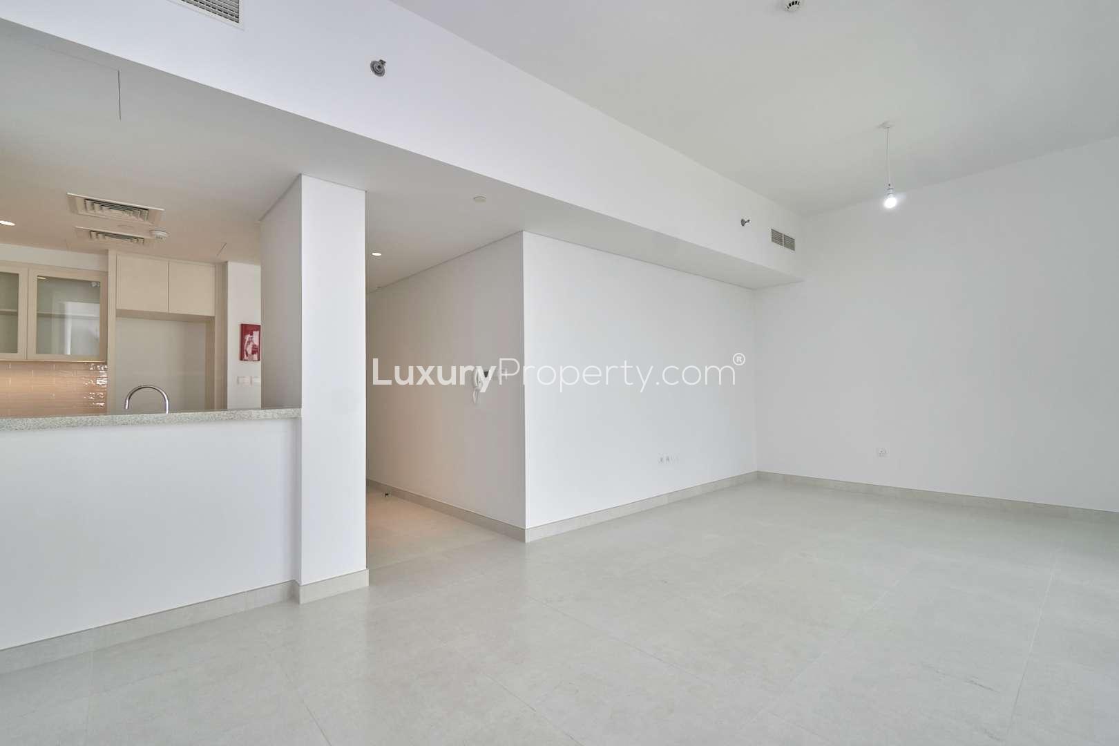 Empty bedroom in Creekside 18 apartment, Dubai Creek Harbour, with built-in wardrobe