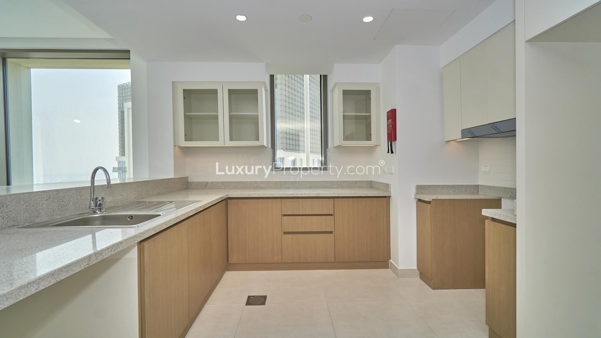 Modern kitchen in Creekside 18 apartment, mid-floor unit with semi-lagoon view, 2 bedrooms