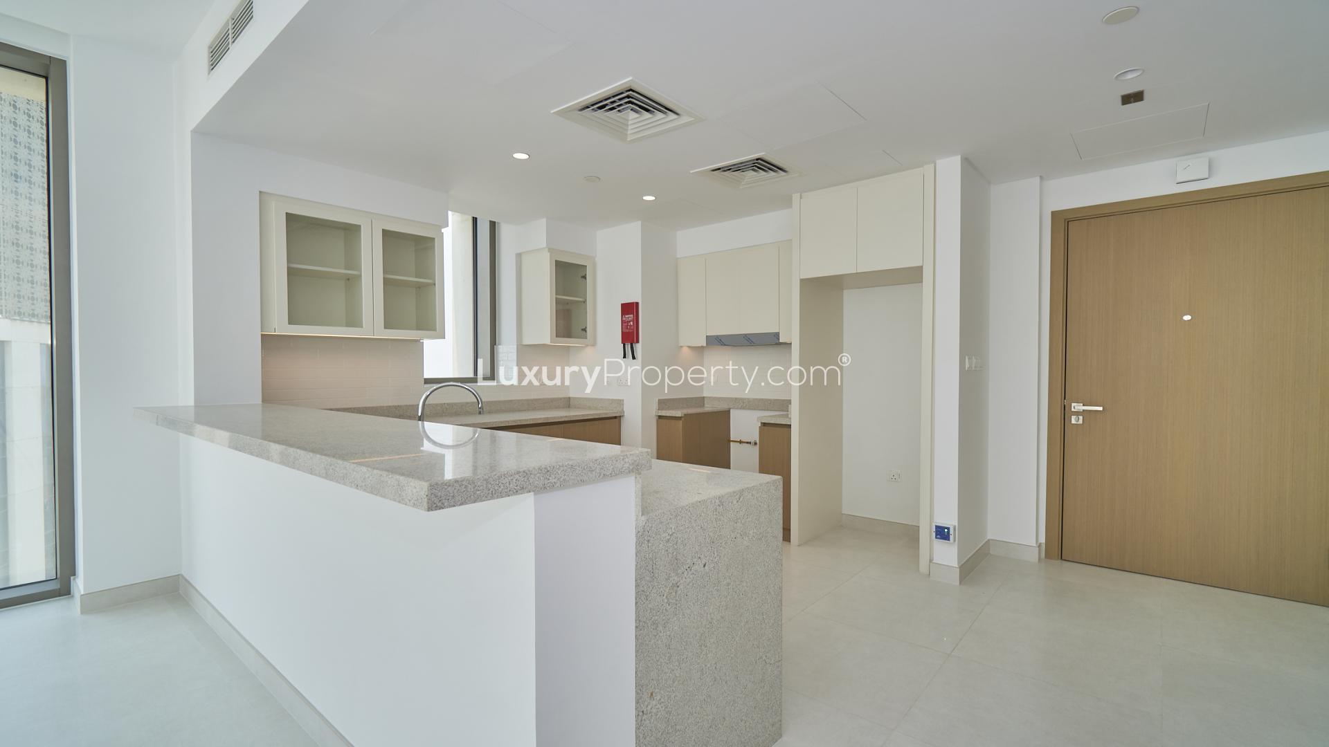 Mid-floor apartment with open-plan kitchen and semi-lagoon view in Creekside 18, 2-bedroom rental