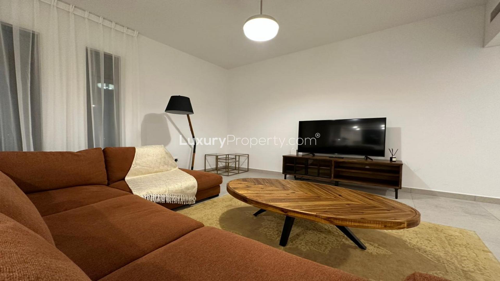 Balcony view from 2-bedroom apartment in Umm Suqeim 3, with modern outdoor seating