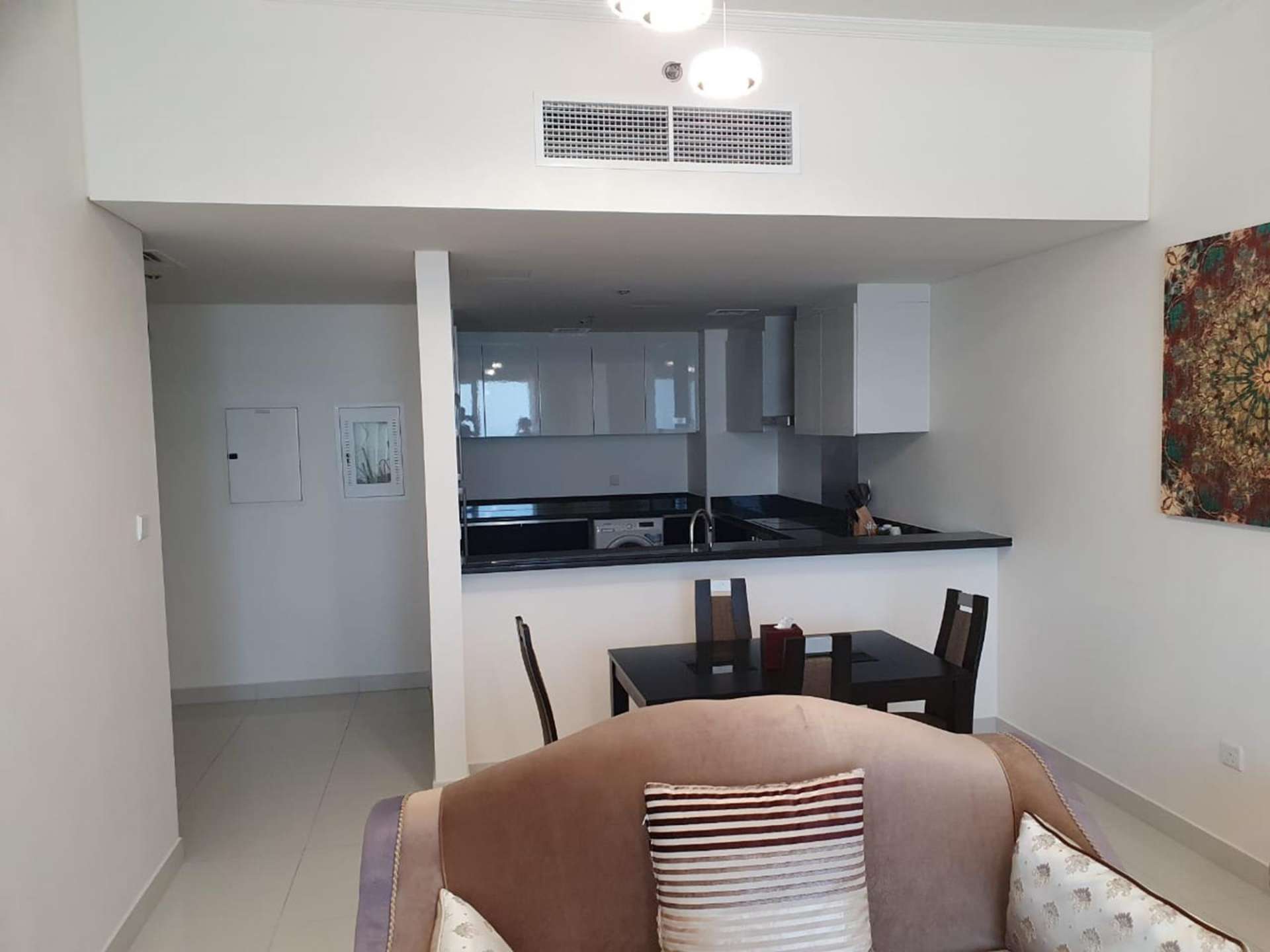 Modern kitchen and dining area in 2-bedroom apartment, Damac Heights, Dubai Marina