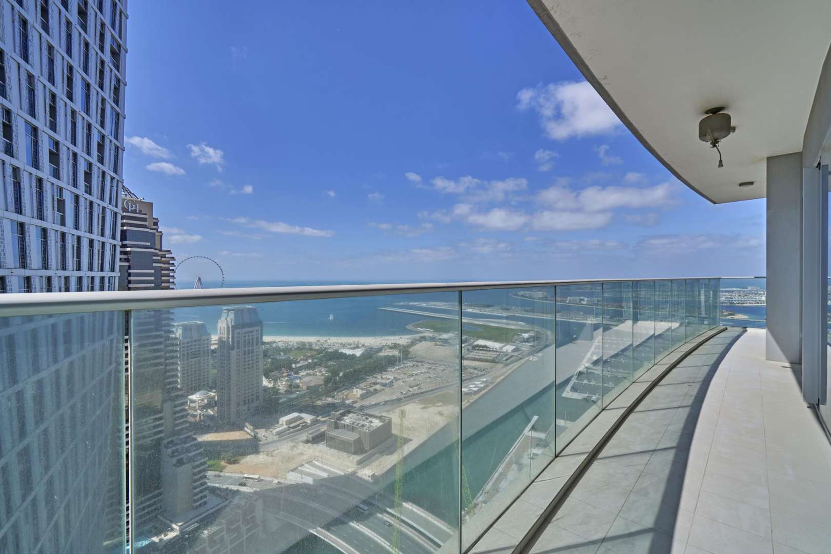 Empty room in Damac Heights apartment, white walls, tiled floor, Dubai Marina rental