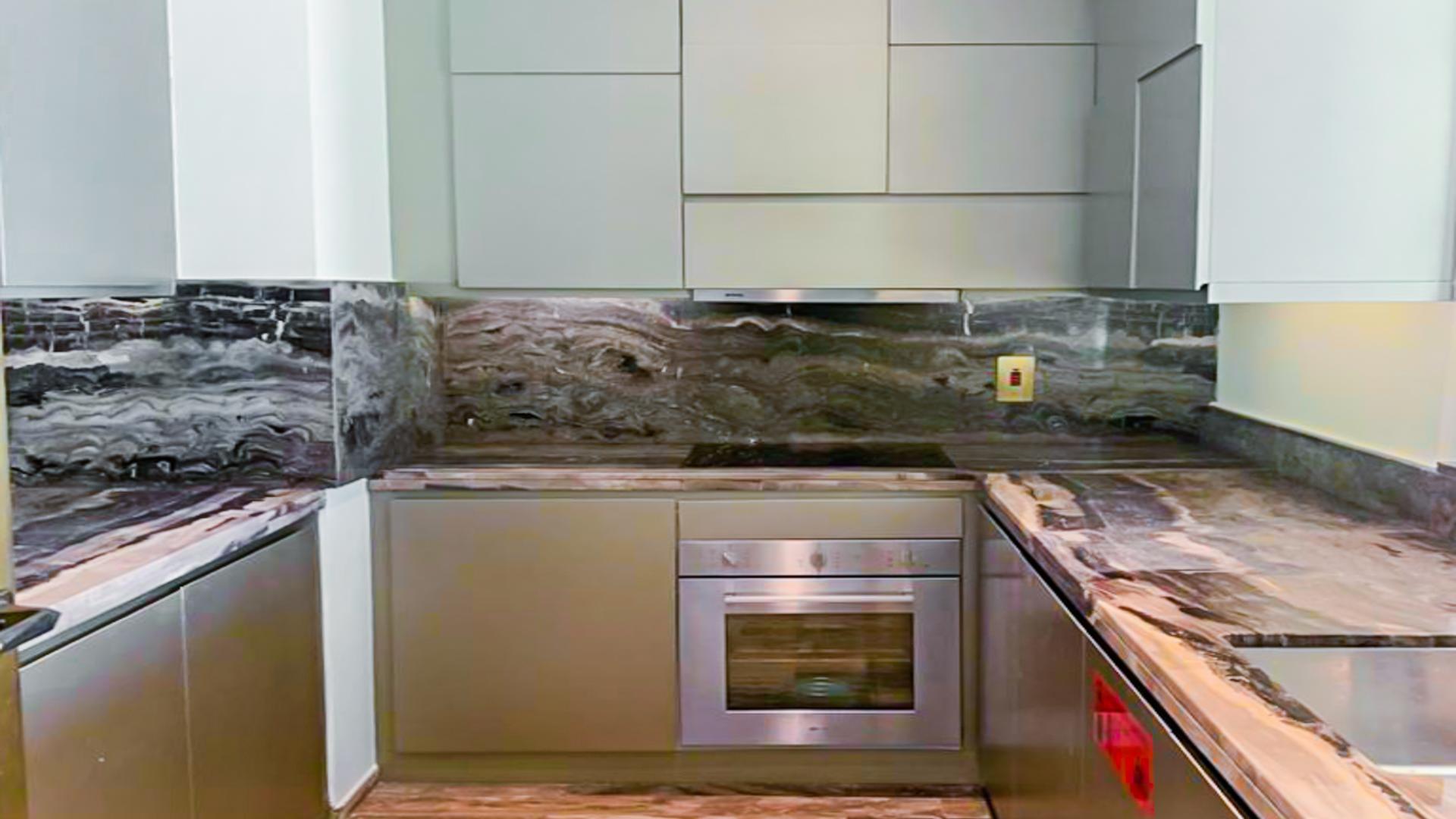 Modern kitchen in luxury Fendi-designed apartment, Damac Heights, Dubai Marina