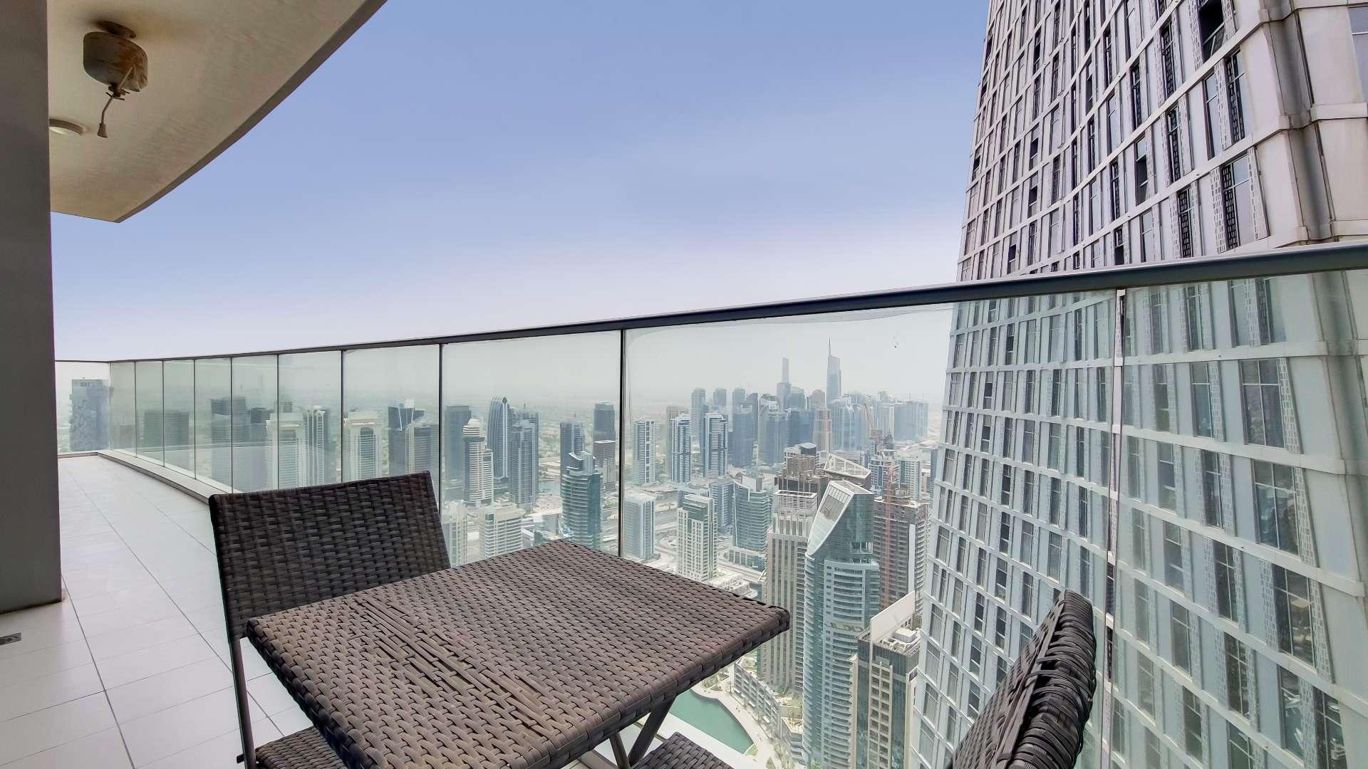 Spacious living room with sea views in Damac Heights apartment, Dubai Marina