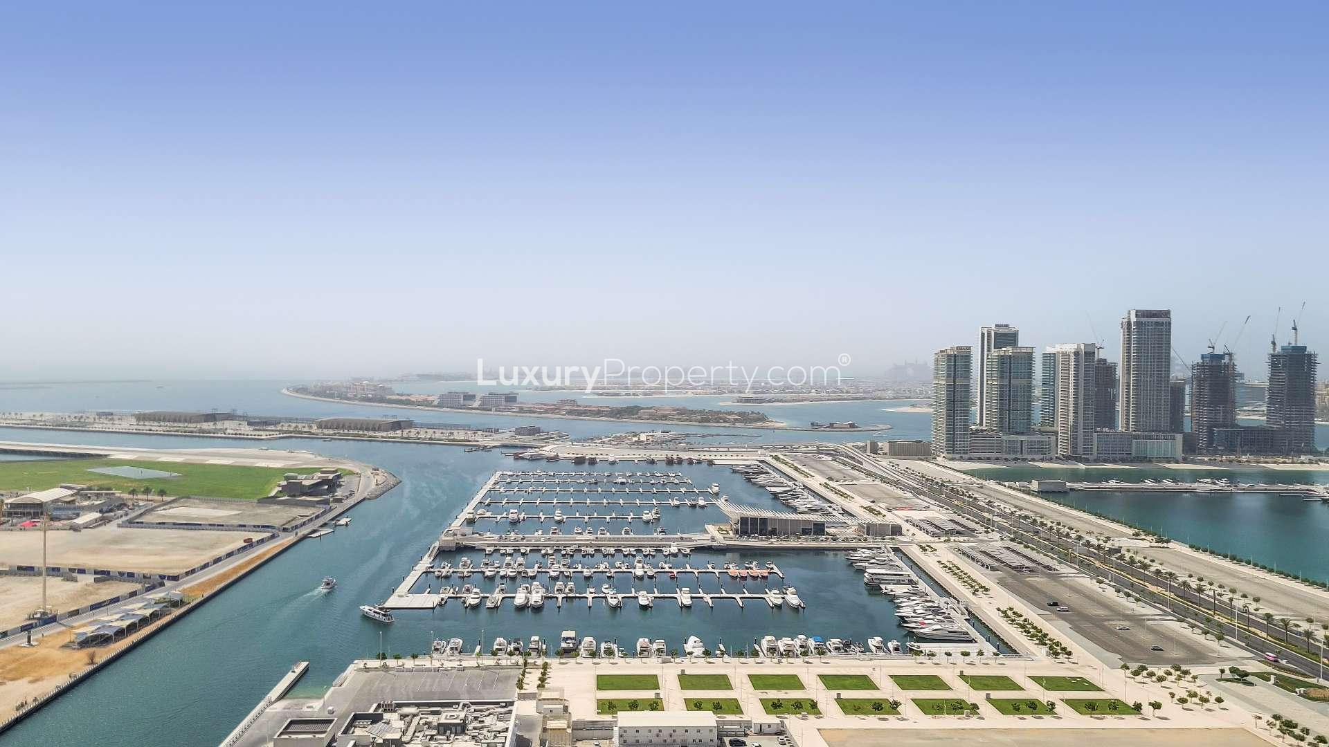 Fully furnished living room in Damac Heights apartment, Dubai Marina, with marina view