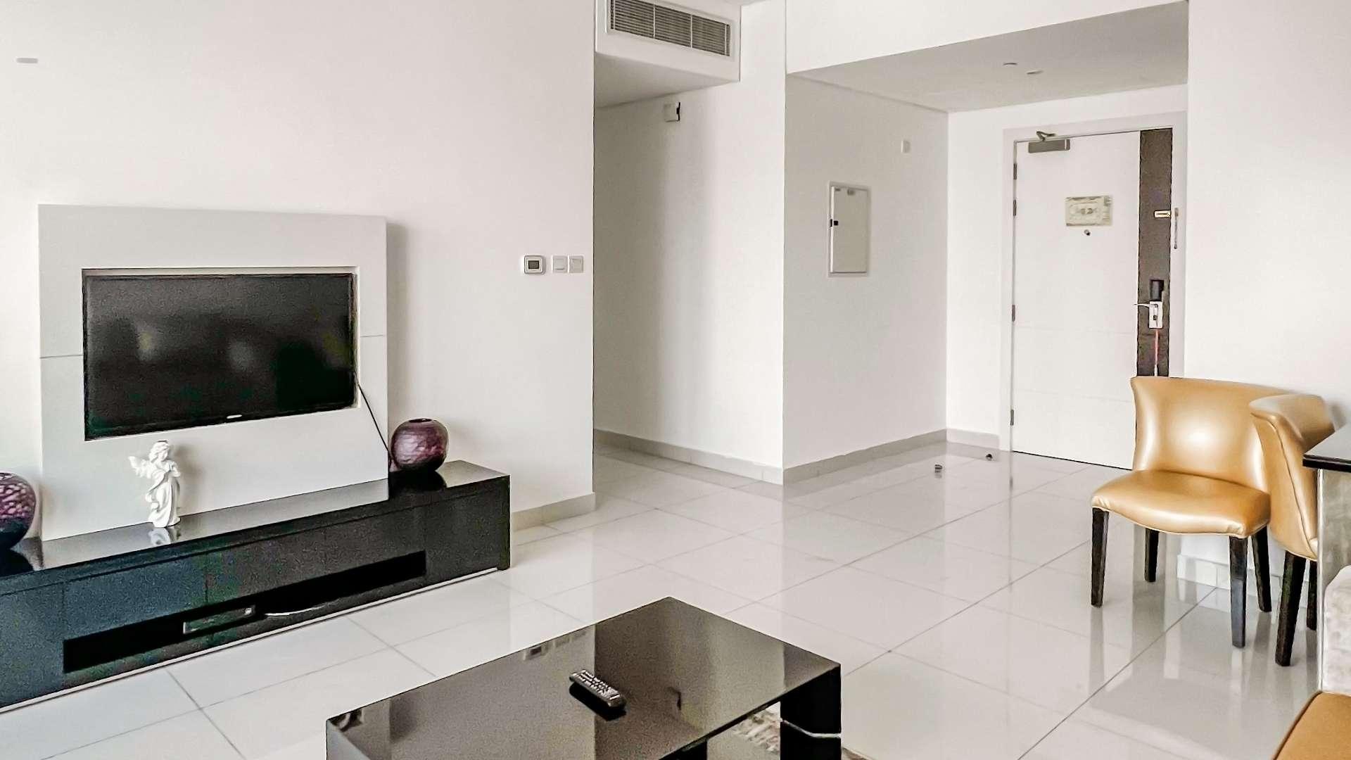 Spacious furnished apartment living room with canal views in Business Bay, DAMAC Maison