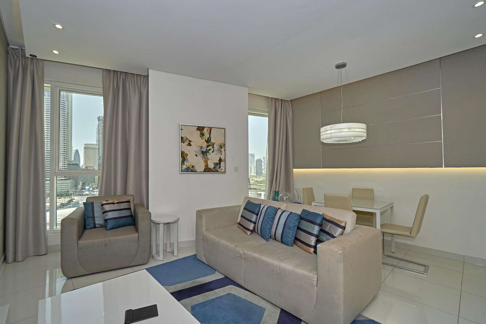 Modern living room and kitchen in Business Bay apartment, DAMAC Maison The Vogue