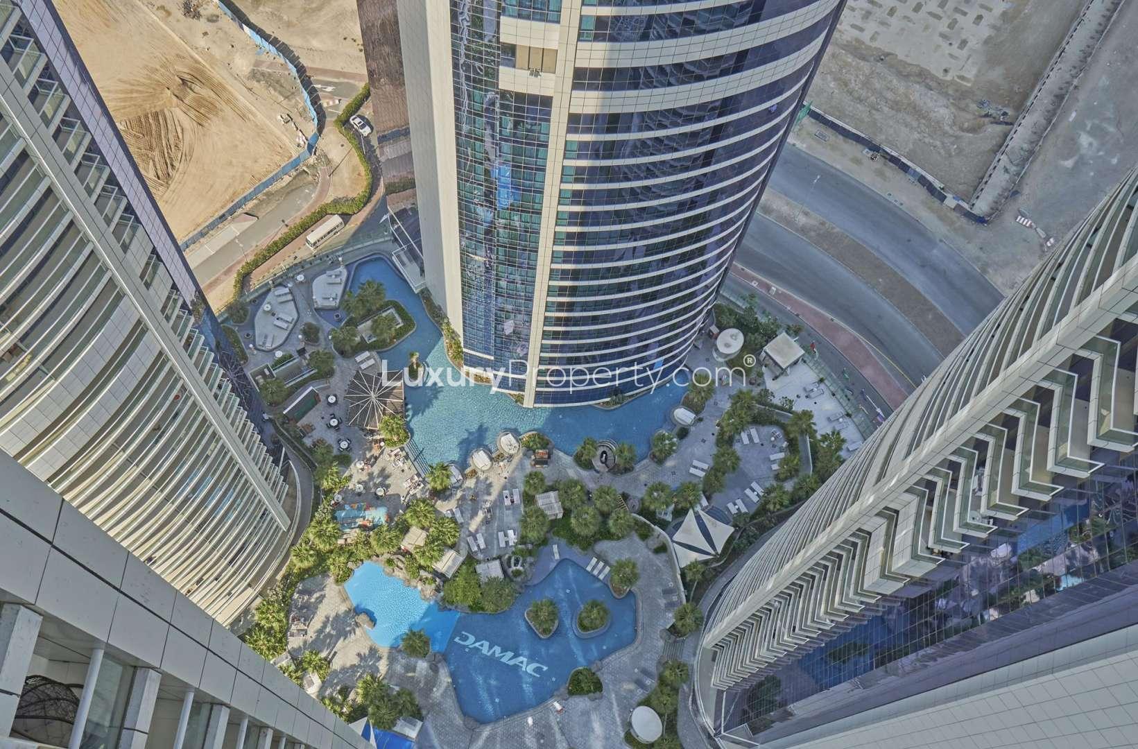 Aerial view of DAMAC Towers by Paramount pool area in Business Bay, Dubai
