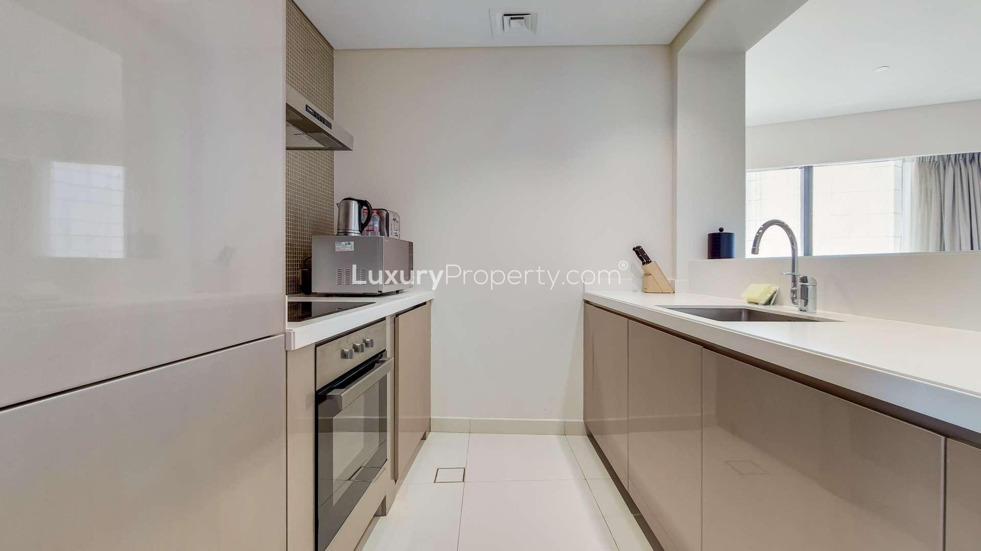 Modern dining area in two-bedroom apartment, Business Bay, DAMAC Towers by Paramount