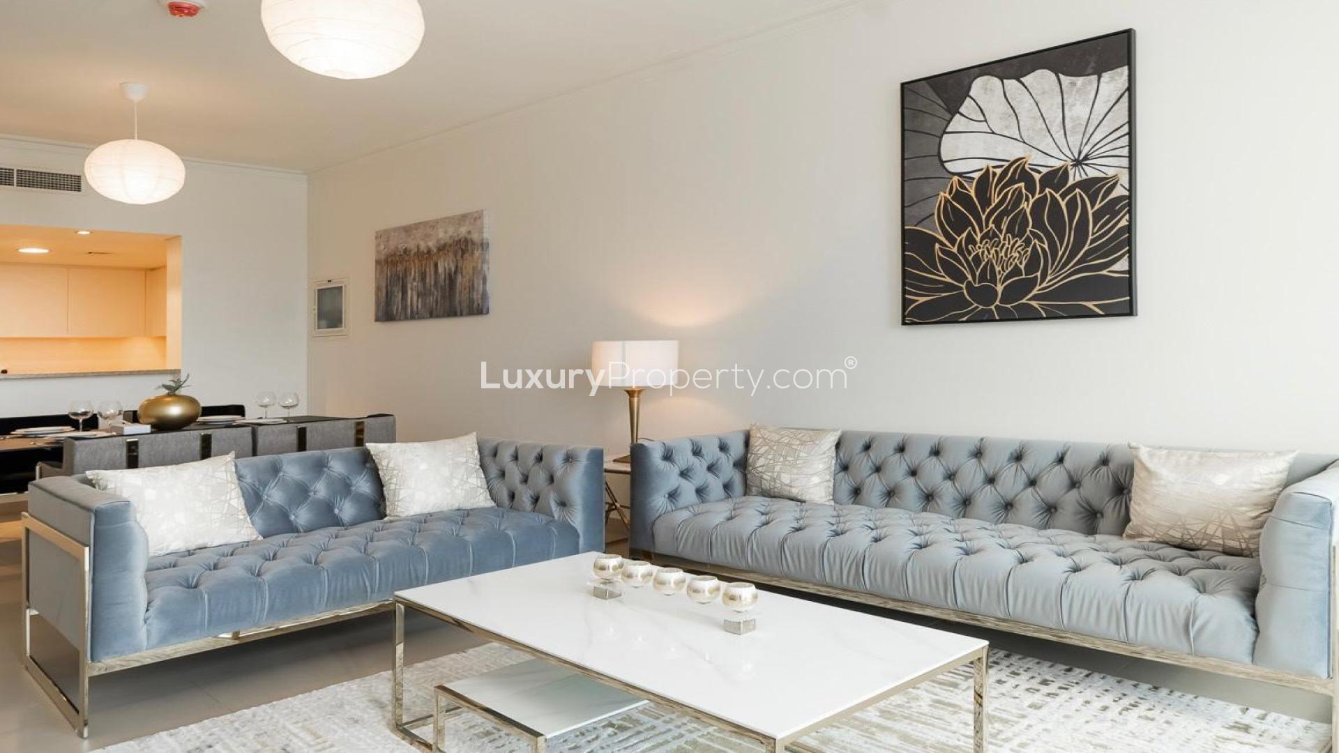 Modern living room in Burj Vista apartment with city view, Downtown Dubai