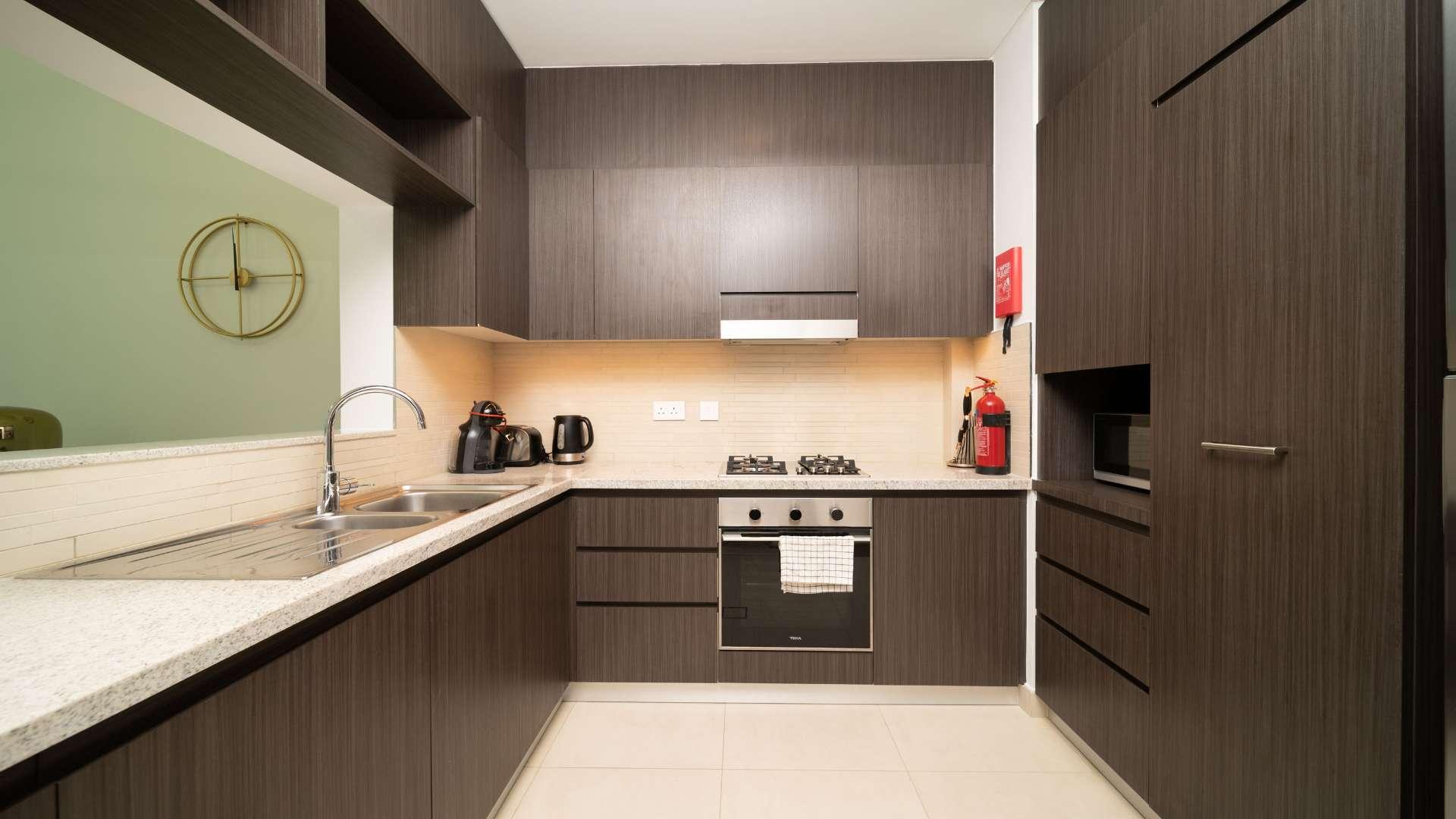 Luxurious furnished living area in two-bedroom apartment, Downtown Views, Downtown Dubai