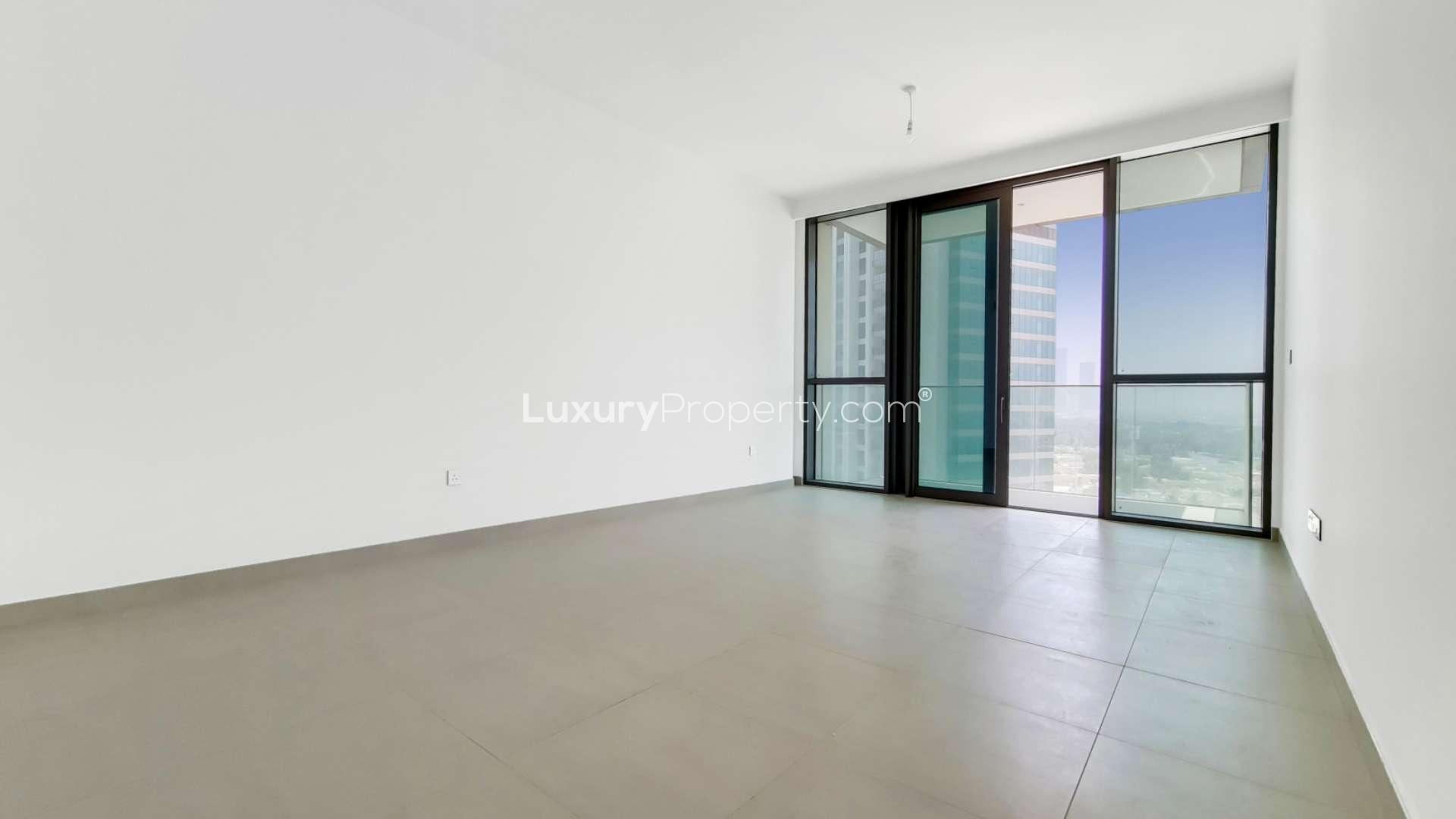 Bright apartment interior with large windows, city views, Downtown Views, Dubai
