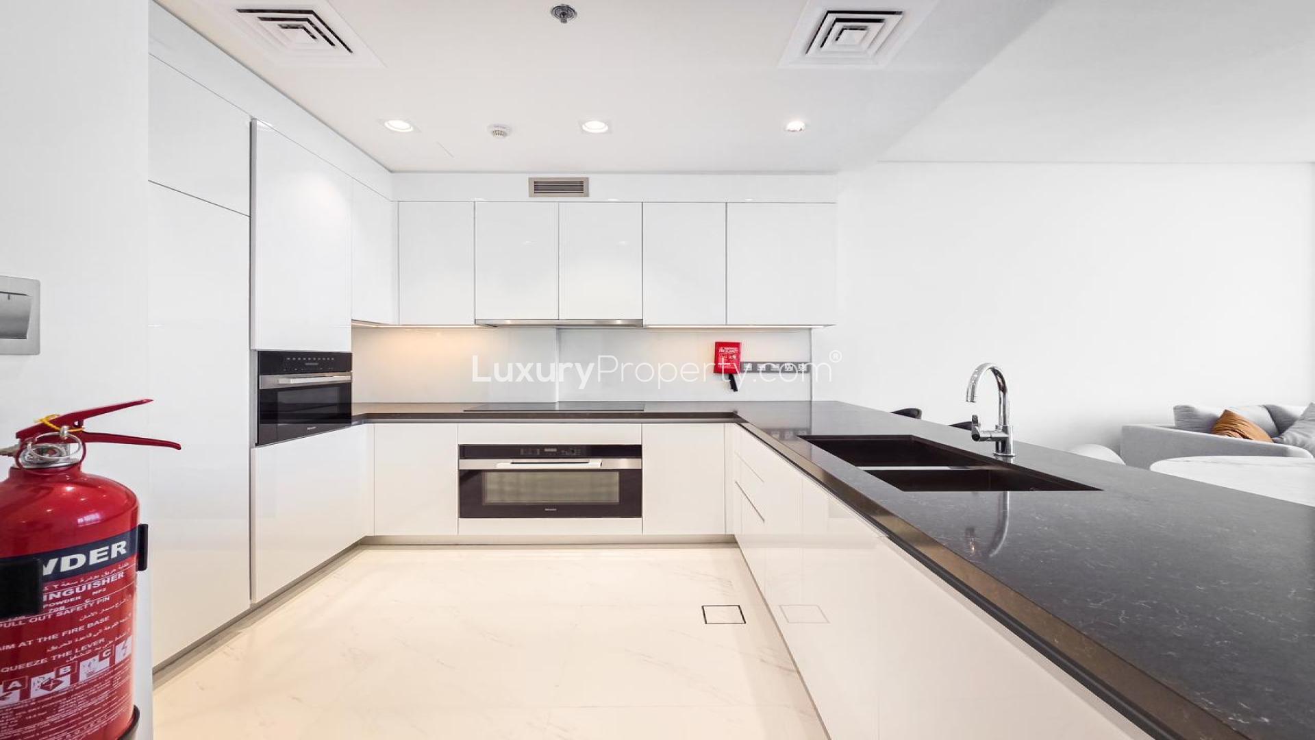 Modern living area in 2-bedroom apartment, Residences 13, MBR City, District One, fully furnished