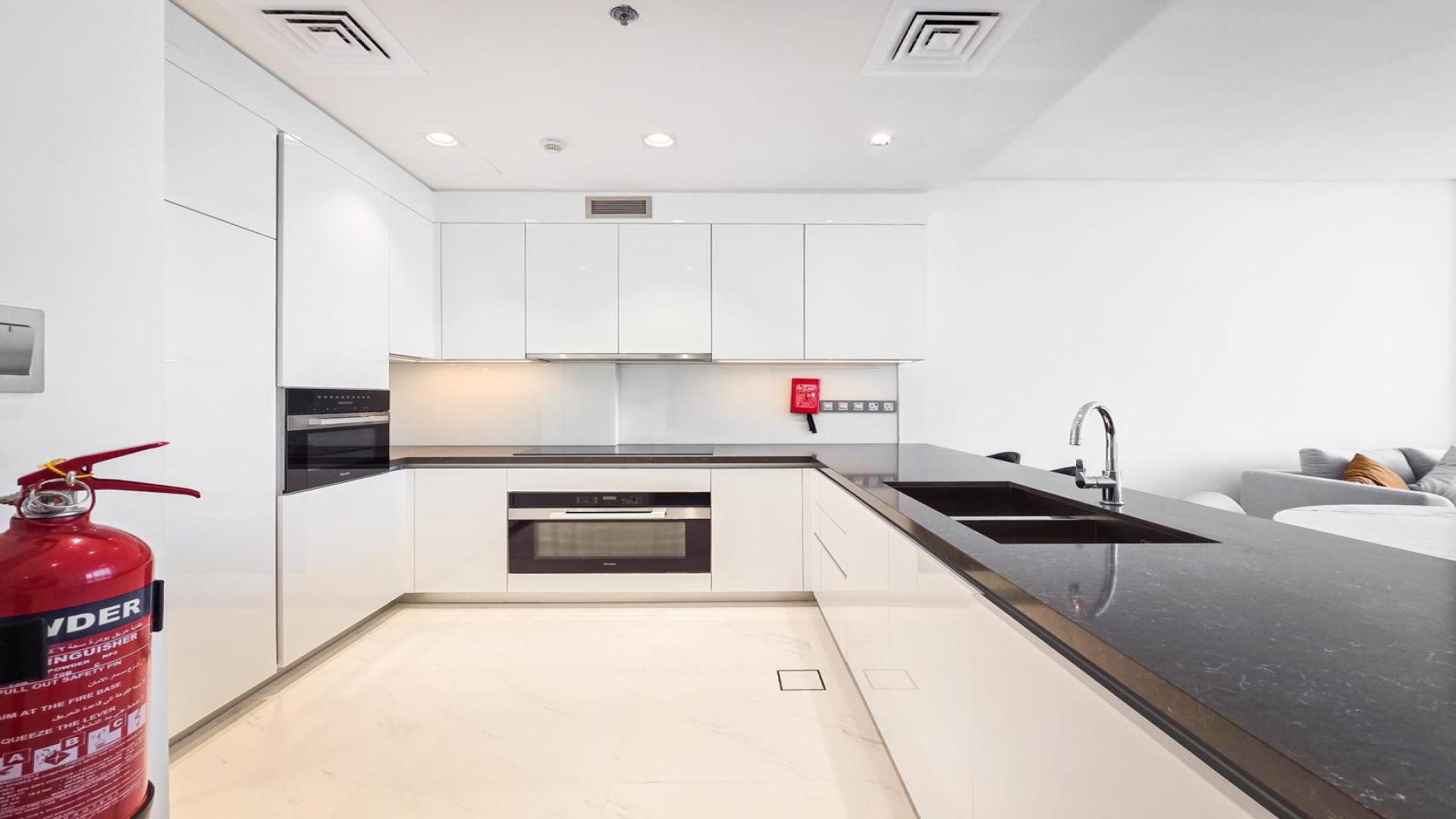 Modern living area in 2-bedroom apartment, Residences 13, MBR City, District One, fully furnished