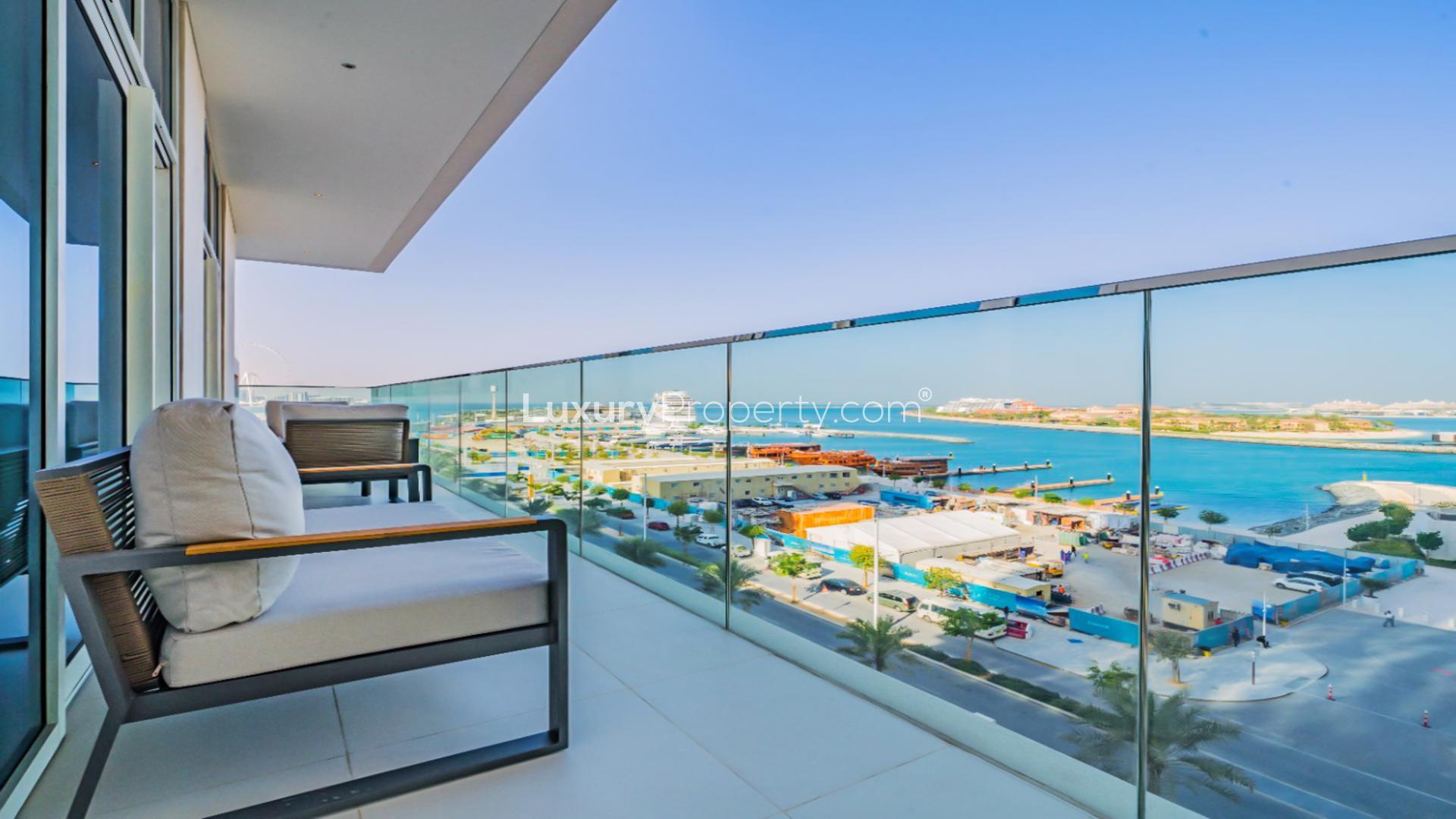 Ultra-modern furnished living room in Dubai Harbour apartment, Emaar Beachfront, with stylish decor
