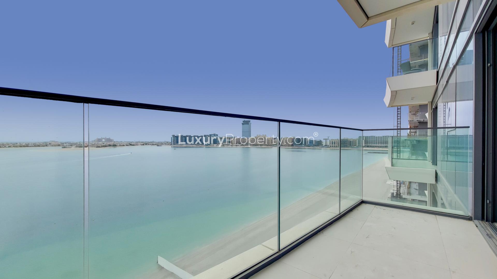 Modern apartment balcony with stunning Palm views in Emaar Beachfront, Dubai Harbour