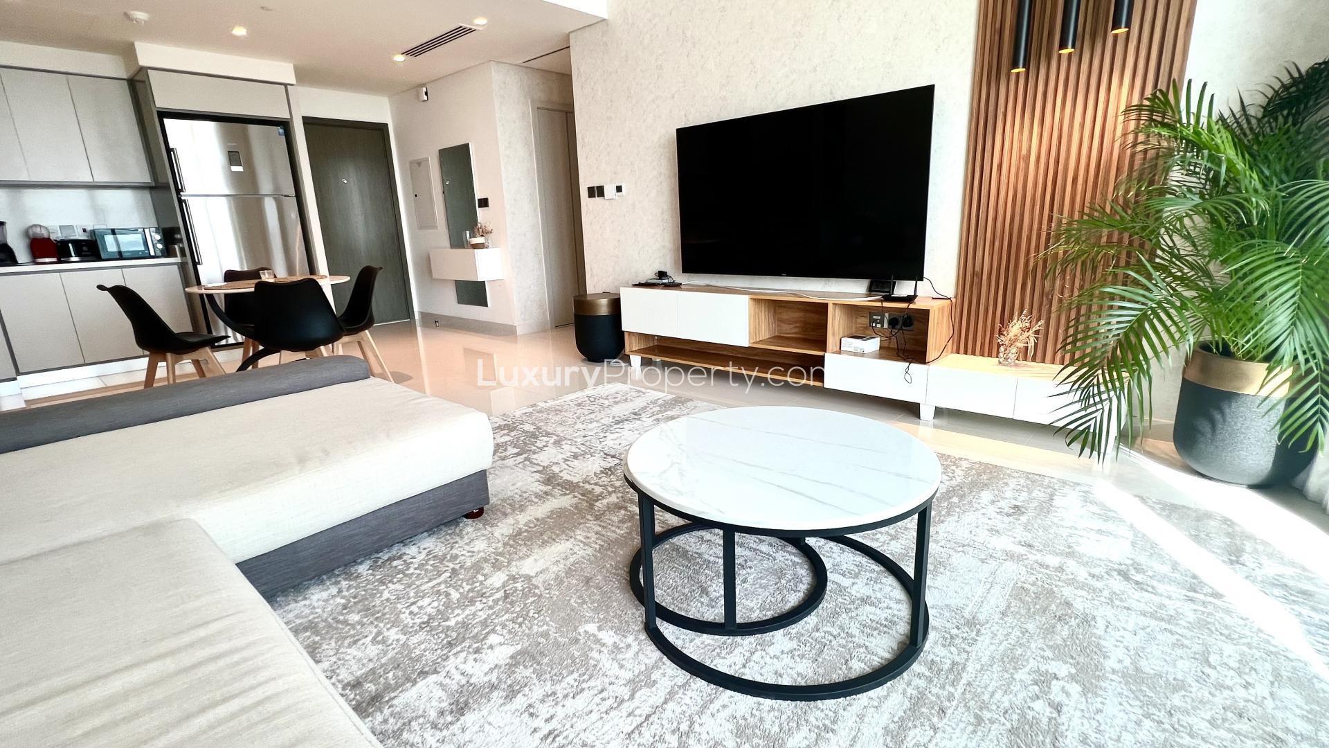 Modern living room in Emaar Beachfront apartment, Dubai Harbour, with stylish decor and furniture