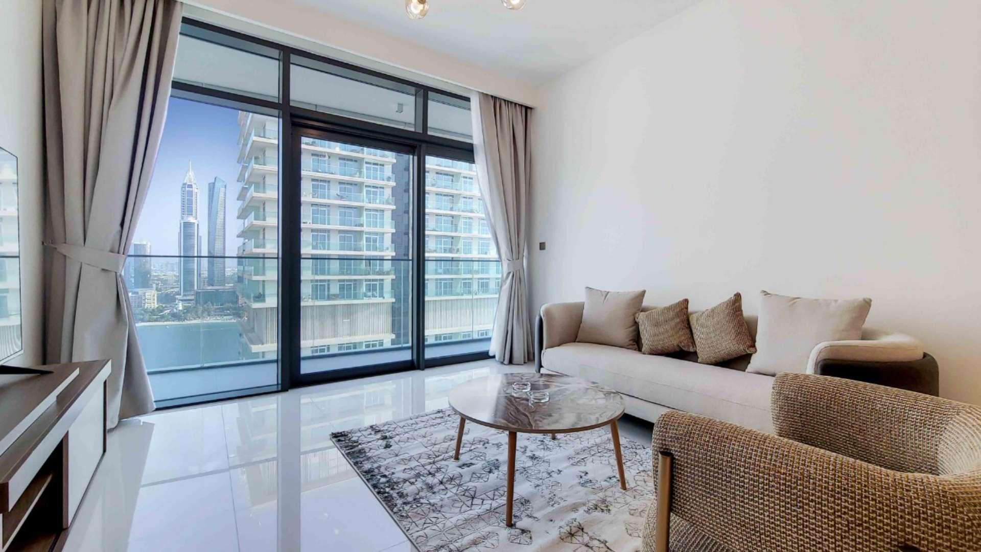 Balcony view of marina and Palm from Emaar Beachfront apartment in Dubai Harbour