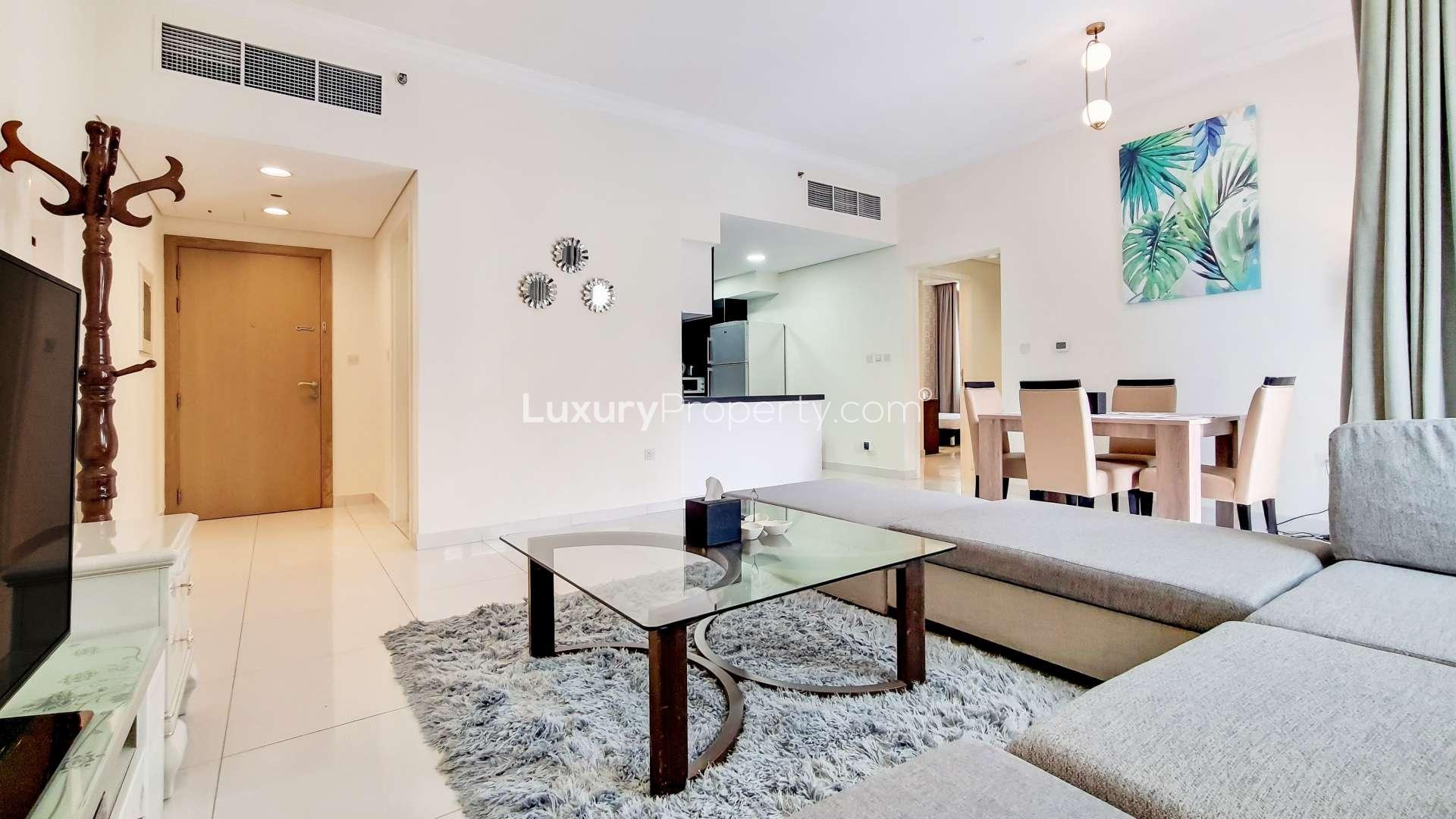 Modern semi-furnished living room in high-floor apartment, Executive Bay, Business Bay for rent
