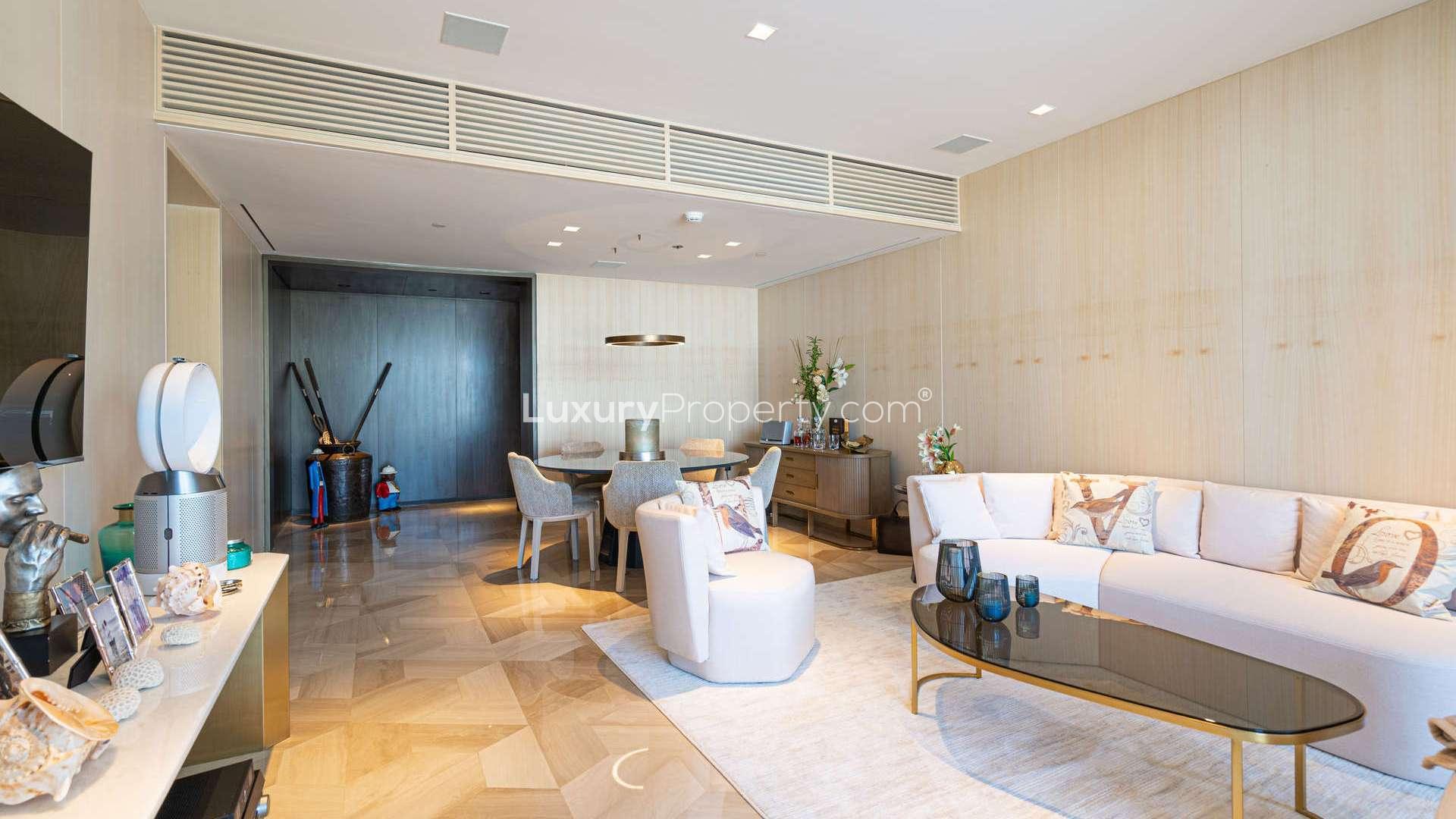 Sea view from Palm Jumeirah apartment balcony, overlooking sunset and community below