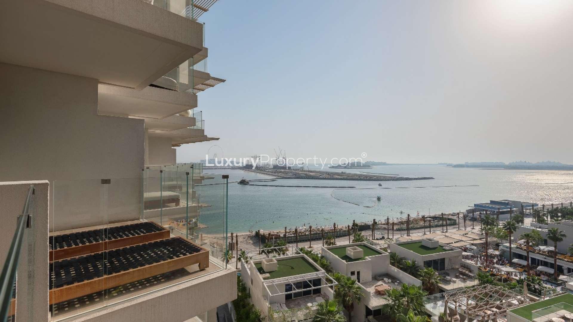 Modern living room in Palm Jumeirah apartment with elegant decor and cozy seating