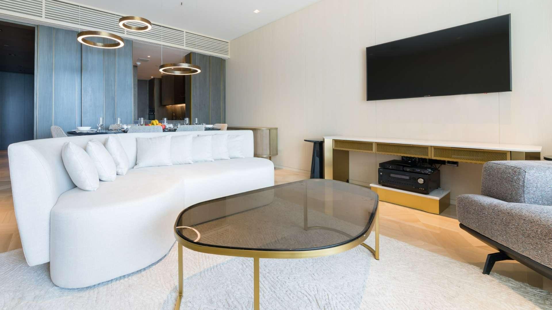 Luxurious furnished living room in Palm Jumeirah apartment, modern decor and elegant design