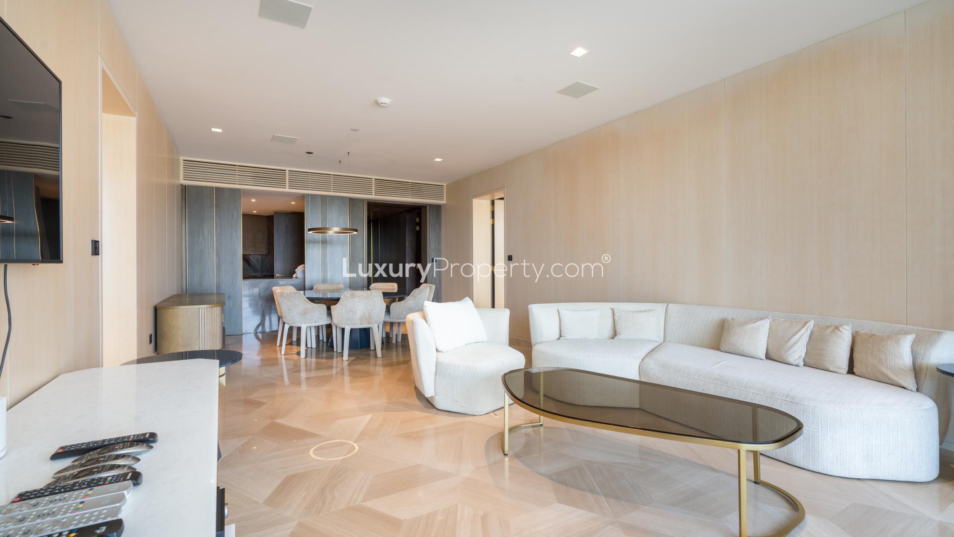 Luxurious living room in fully furnished Palm Jumeirah apartment, modern decor, elegant furnishings
