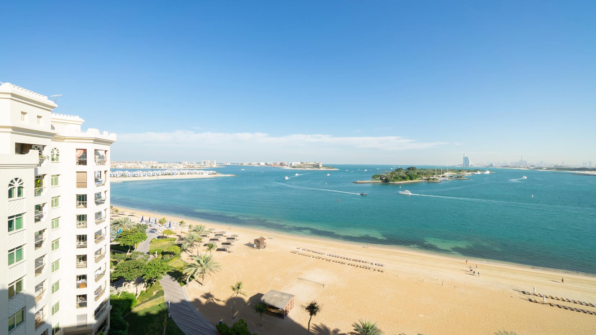 Modern furnished living room in Shoreline Apartments, Palm Jumeirah with sea views