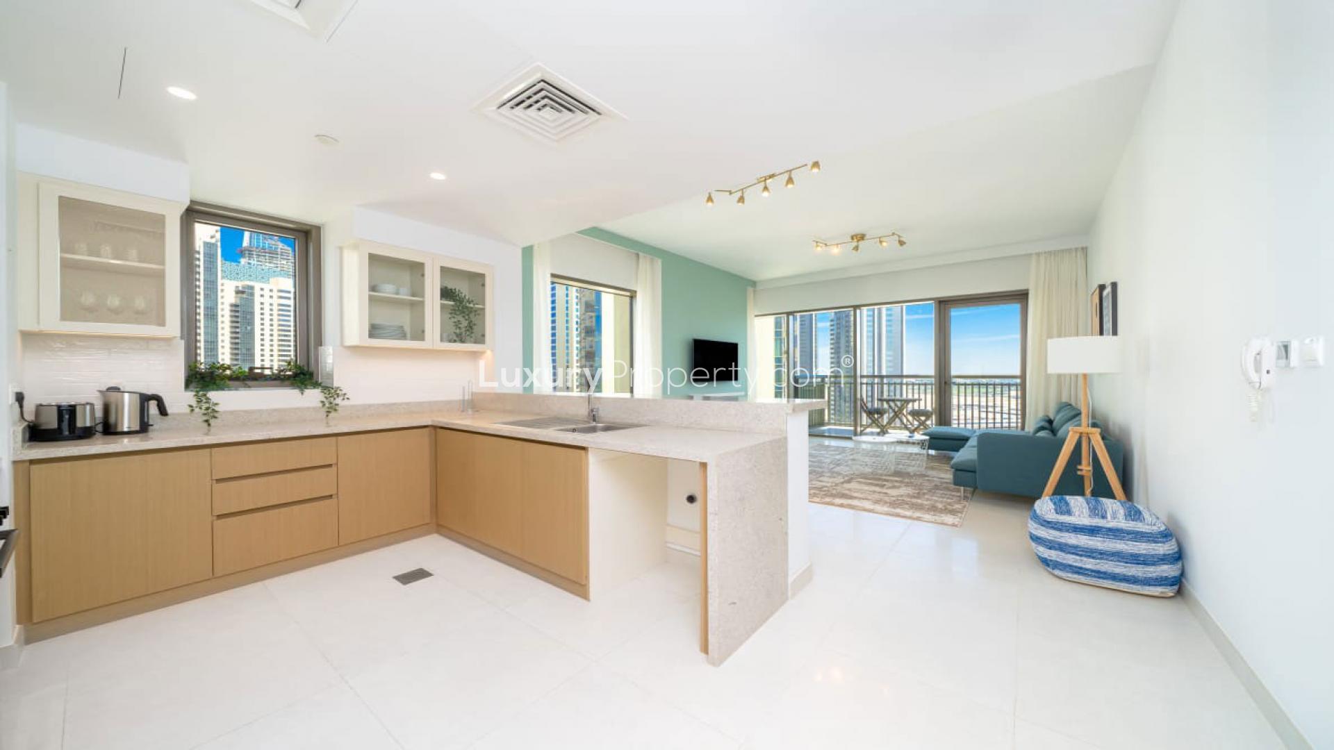 Modern living room in Creekside 18 apartment, Dubai Creek Harbour, featuring sleek furnishings