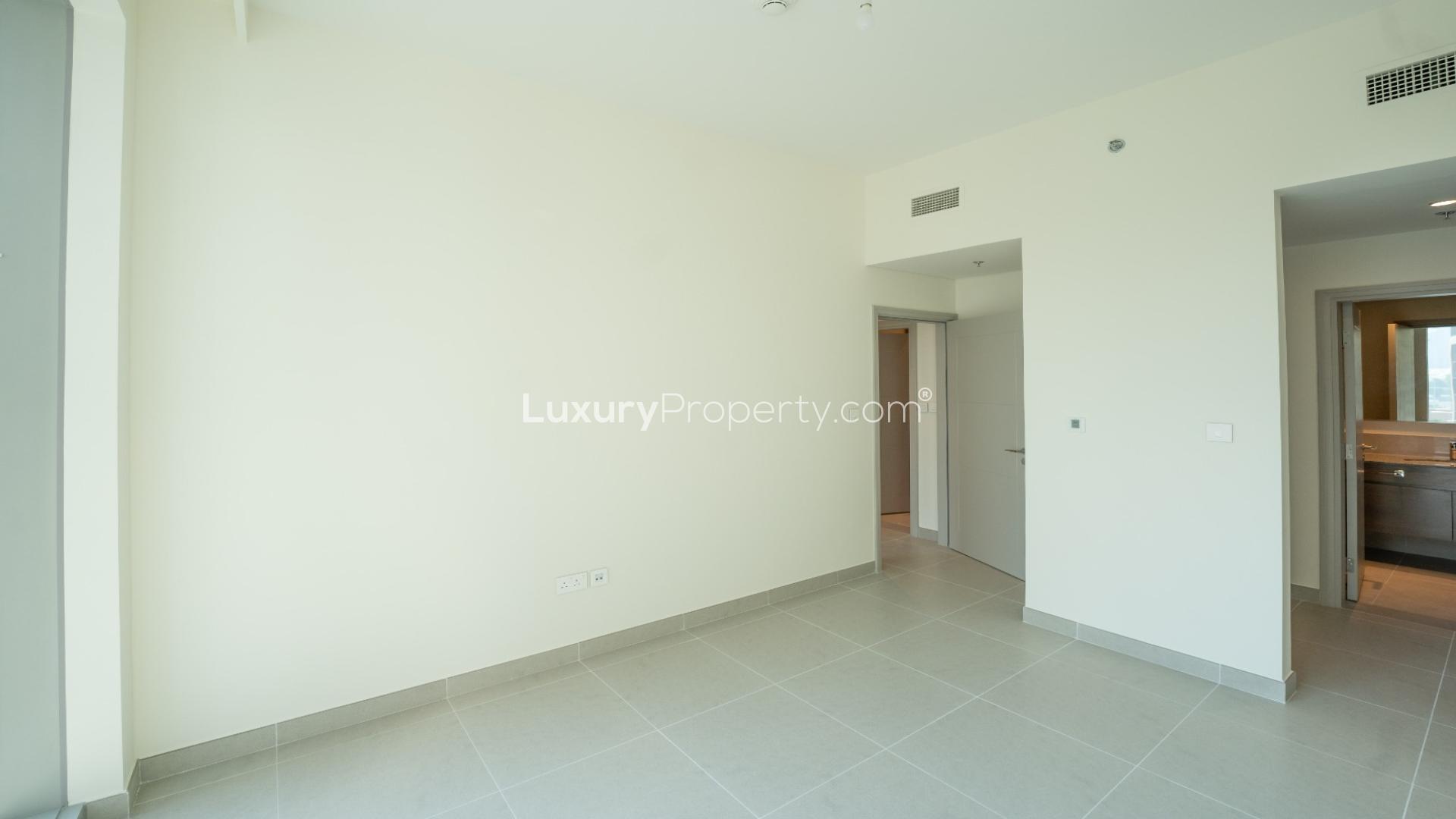 Modern kitchen and living area in 2-bed apartment, Forte, Downtown Dubai, available for rent