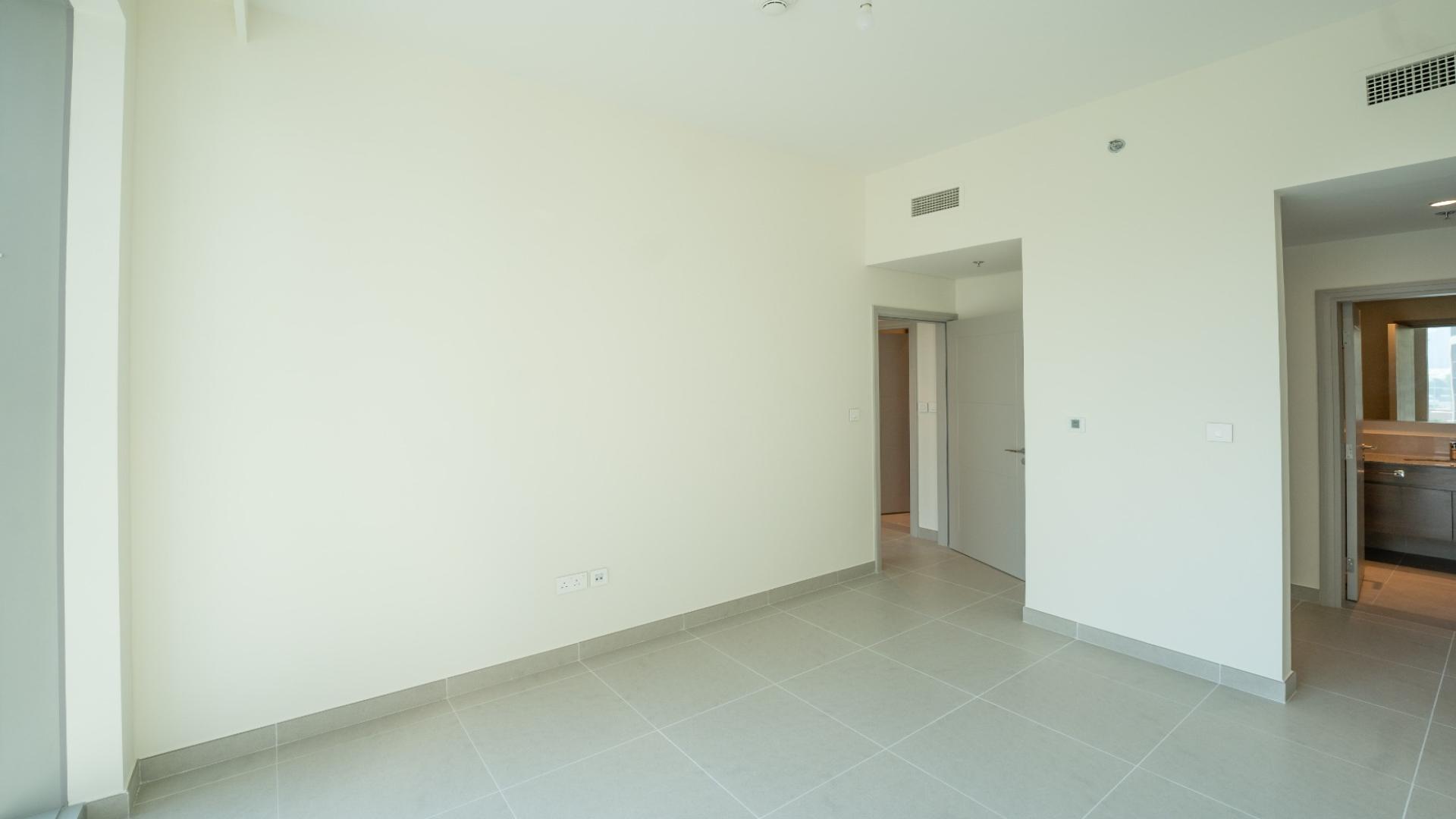 Modern kitchen and living area in 2-bed apartment, Forte, Downtown Dubai, available for rent