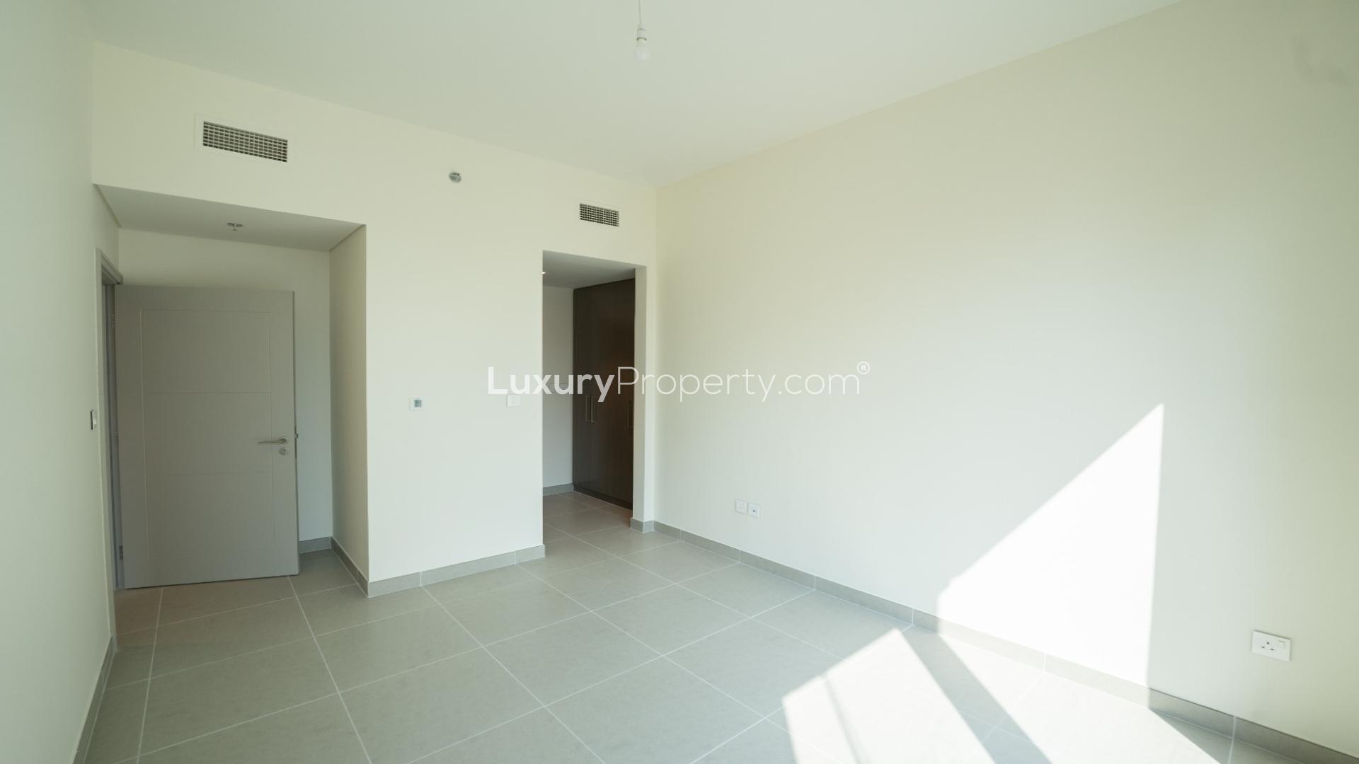 Modern open-plan kitchen and living area in 2-bed apartment, Forte, Downtown Dubai