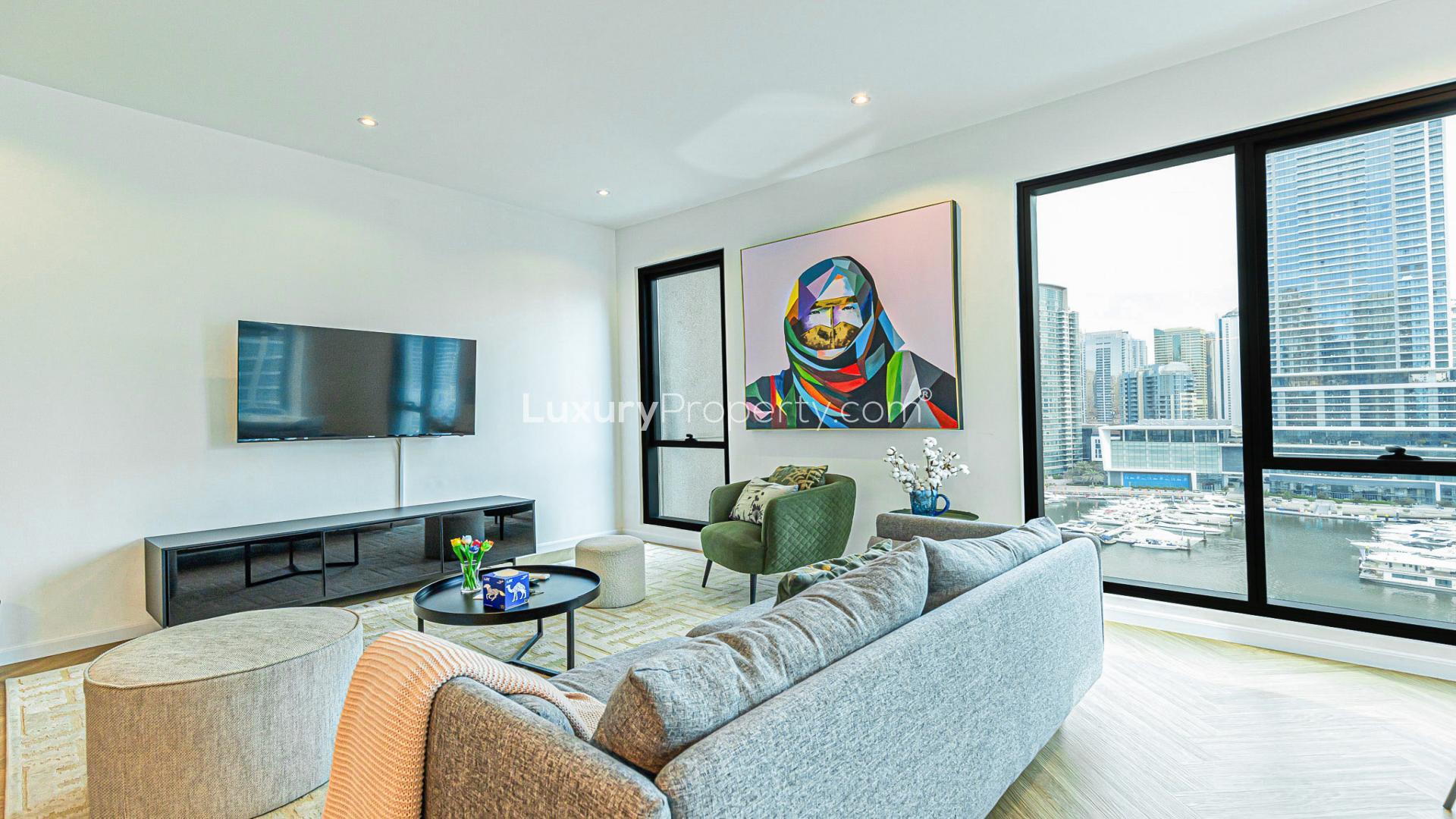 Modern living area in luxury 2-bed apartment, Dubai Marina, with open kitchen and decor