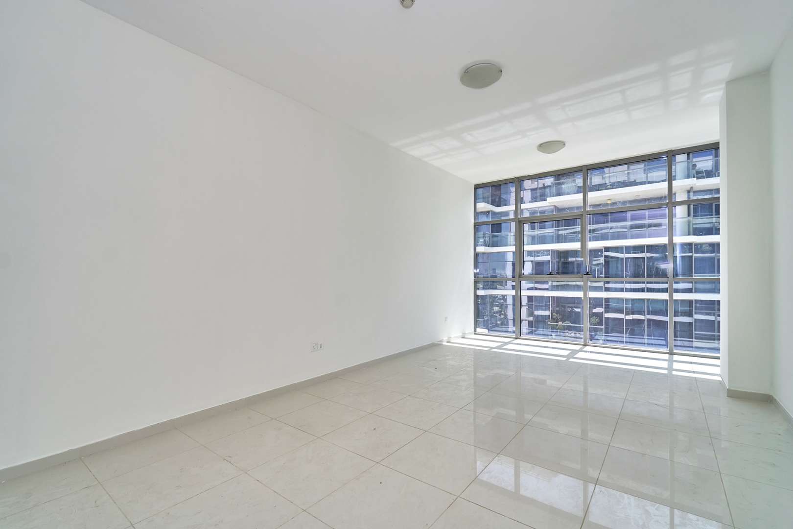 Empty room in 2-bedroom apartment for rent, Damac Hills Golf Vista