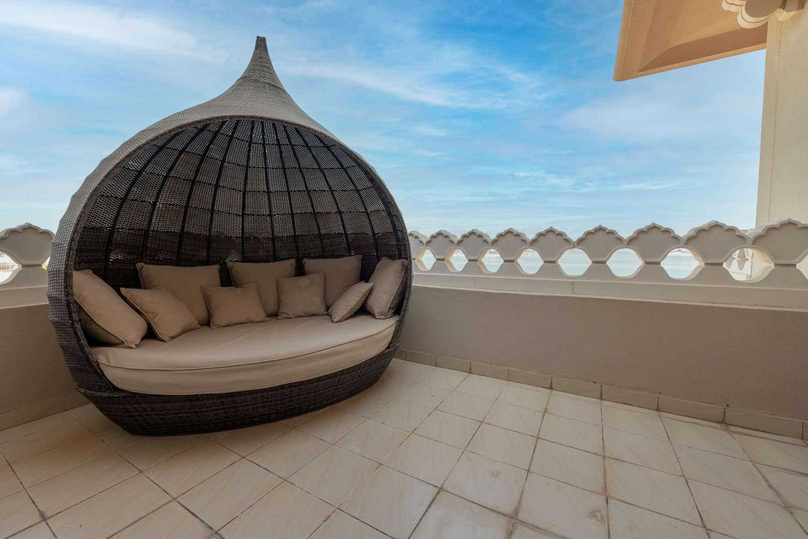 Luxurious bedroom in Grandeur Residences, Palm Jumeirah with sea view and elegant decor