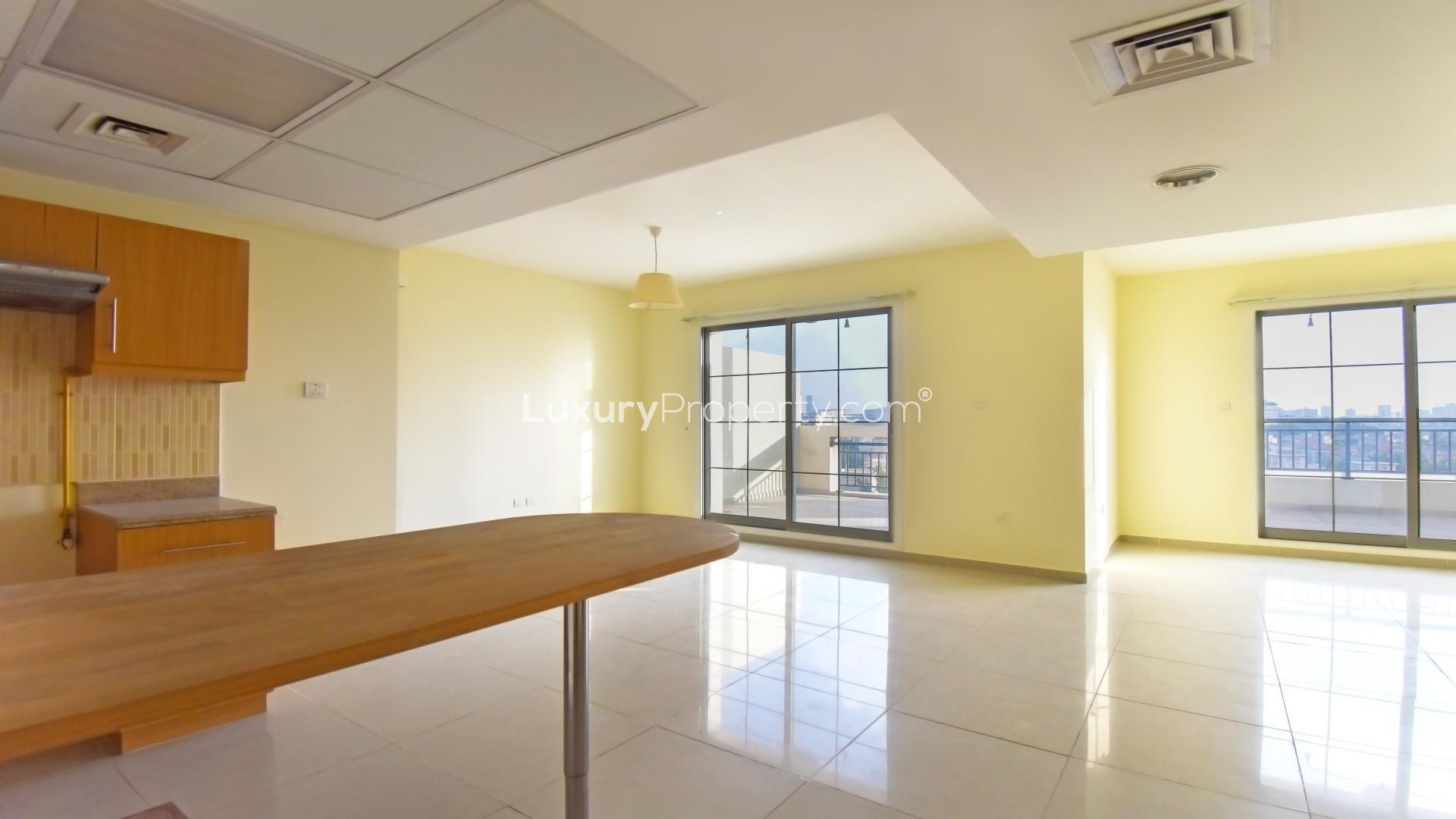 "Spacious terrace view from 2-bedroom duplex in Green Park, Jumeirah Village Triangle.",Bright living area in 2-bedroom duplex with terrace, Jumeirah Village Triangle, for rent