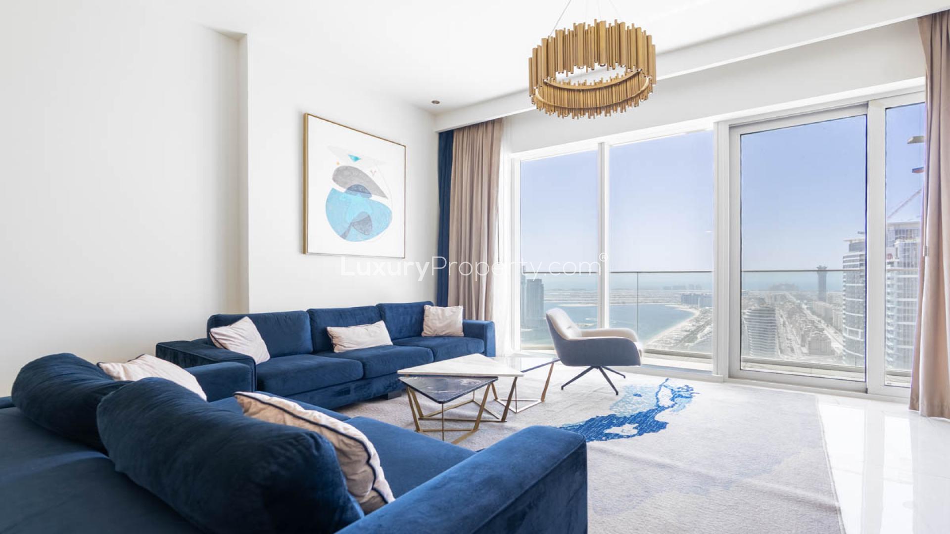 Modern living room in Avani Palm View apartment, Dubai Media City, with cityscape views