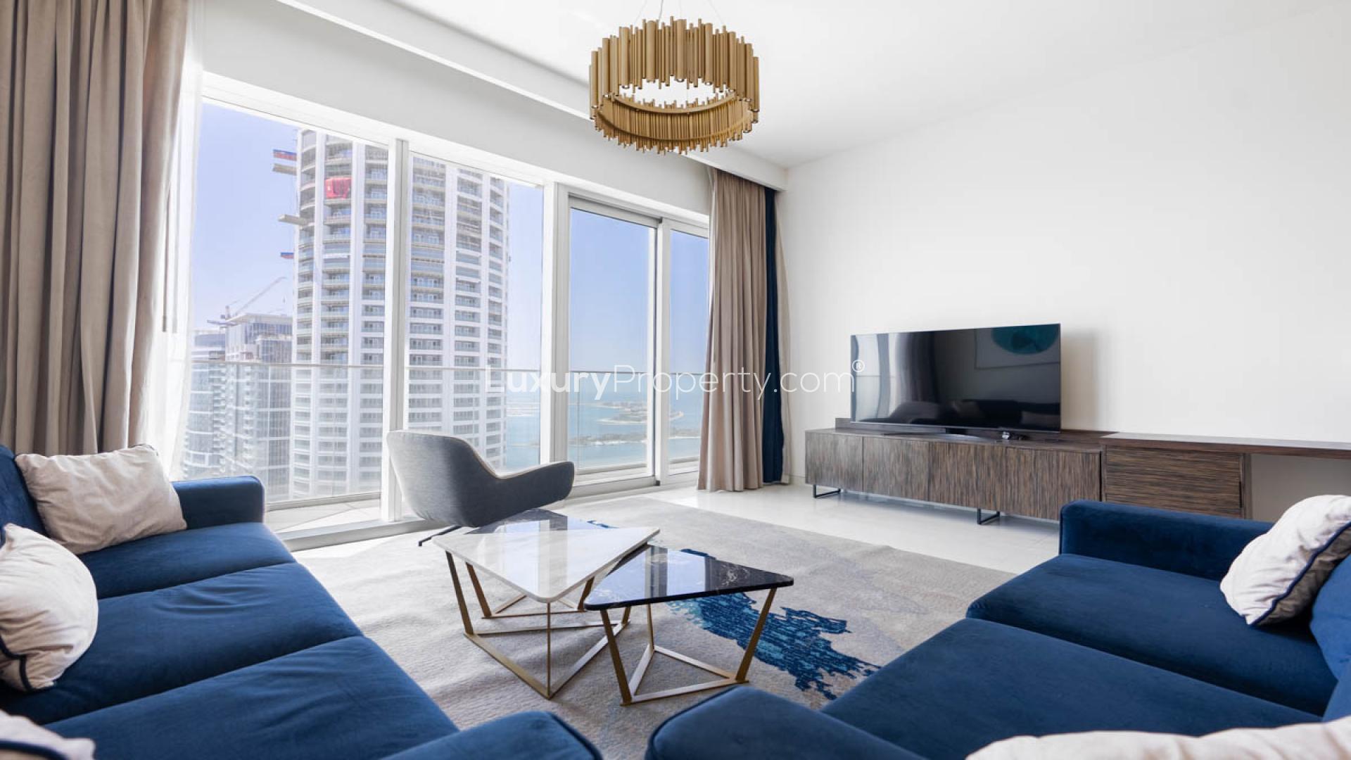 High-floor apartment balcony view of Dubai Marina skyline and Palm Jumeirah, Avani Palm View